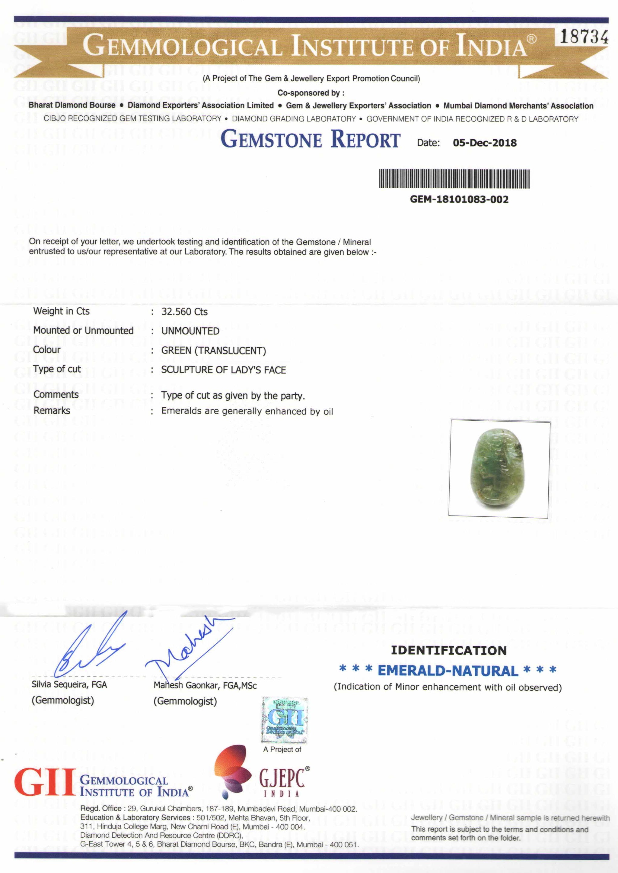 8801469-carved-intense-green-gii-zambia-natural-emerald-32.56-ct