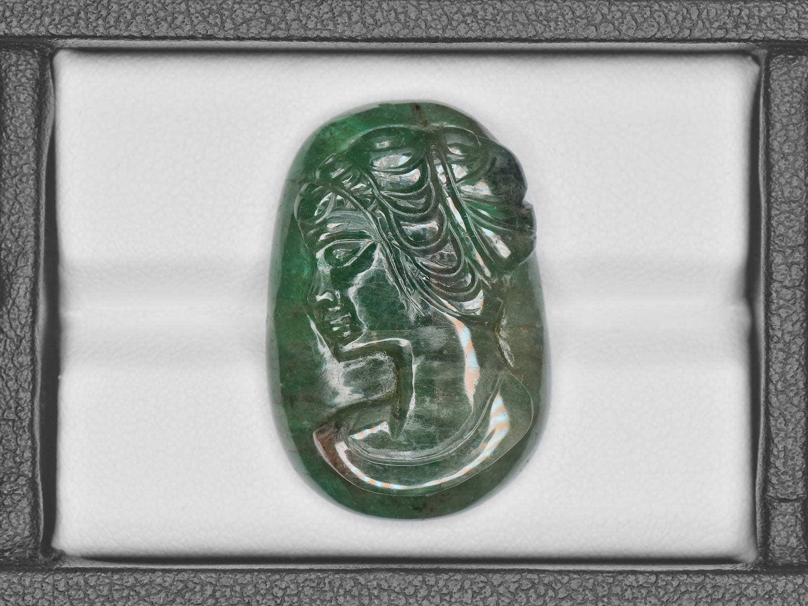 8801469-carved-intense-green-gii-zambia-natural-emerald-32.56-ct