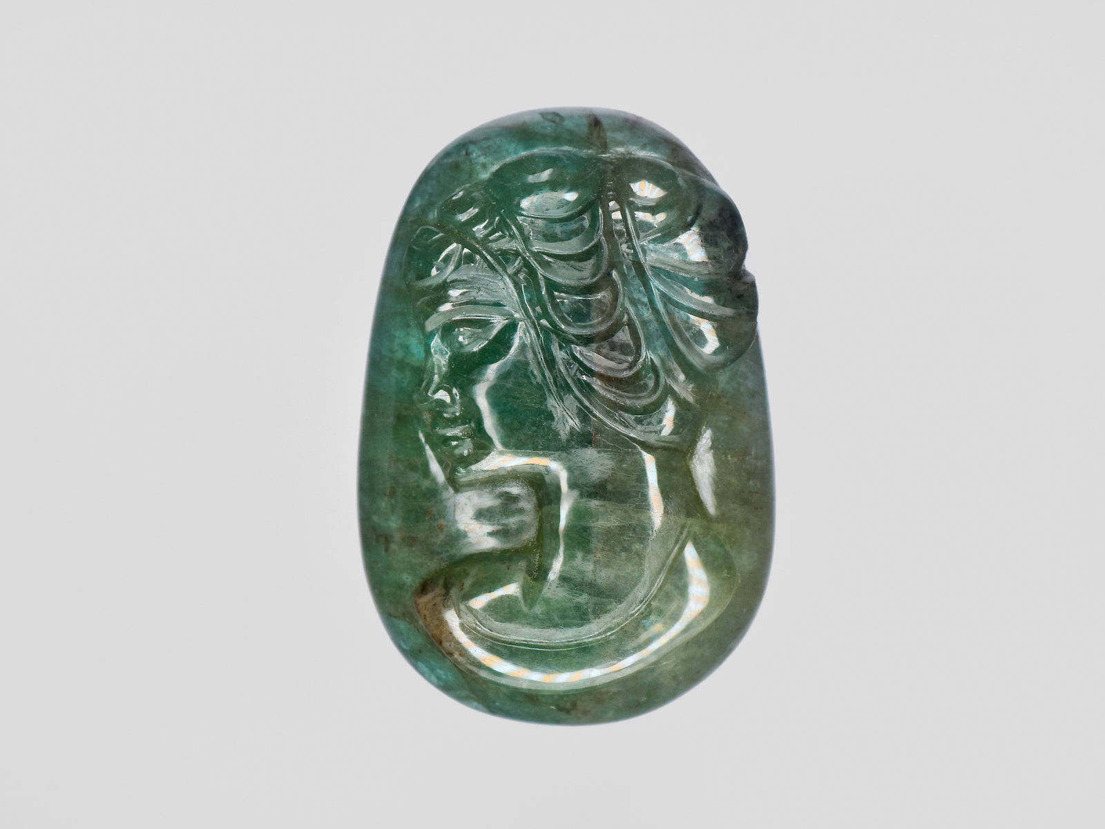 8801469-carved-intense-green-gii-zambia-natural-emerald-32.56-ct