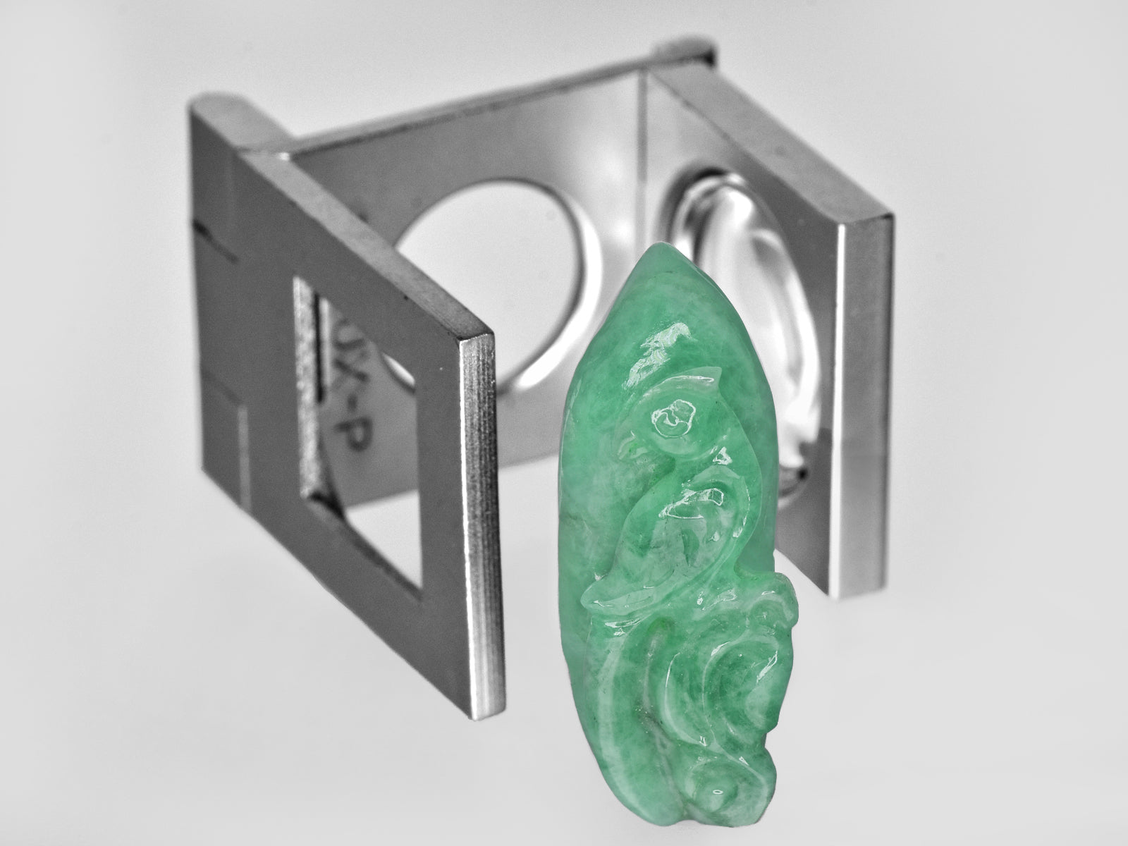 8801471-carved-light-green-gii-zambia-natural-emerald-15.15-ct