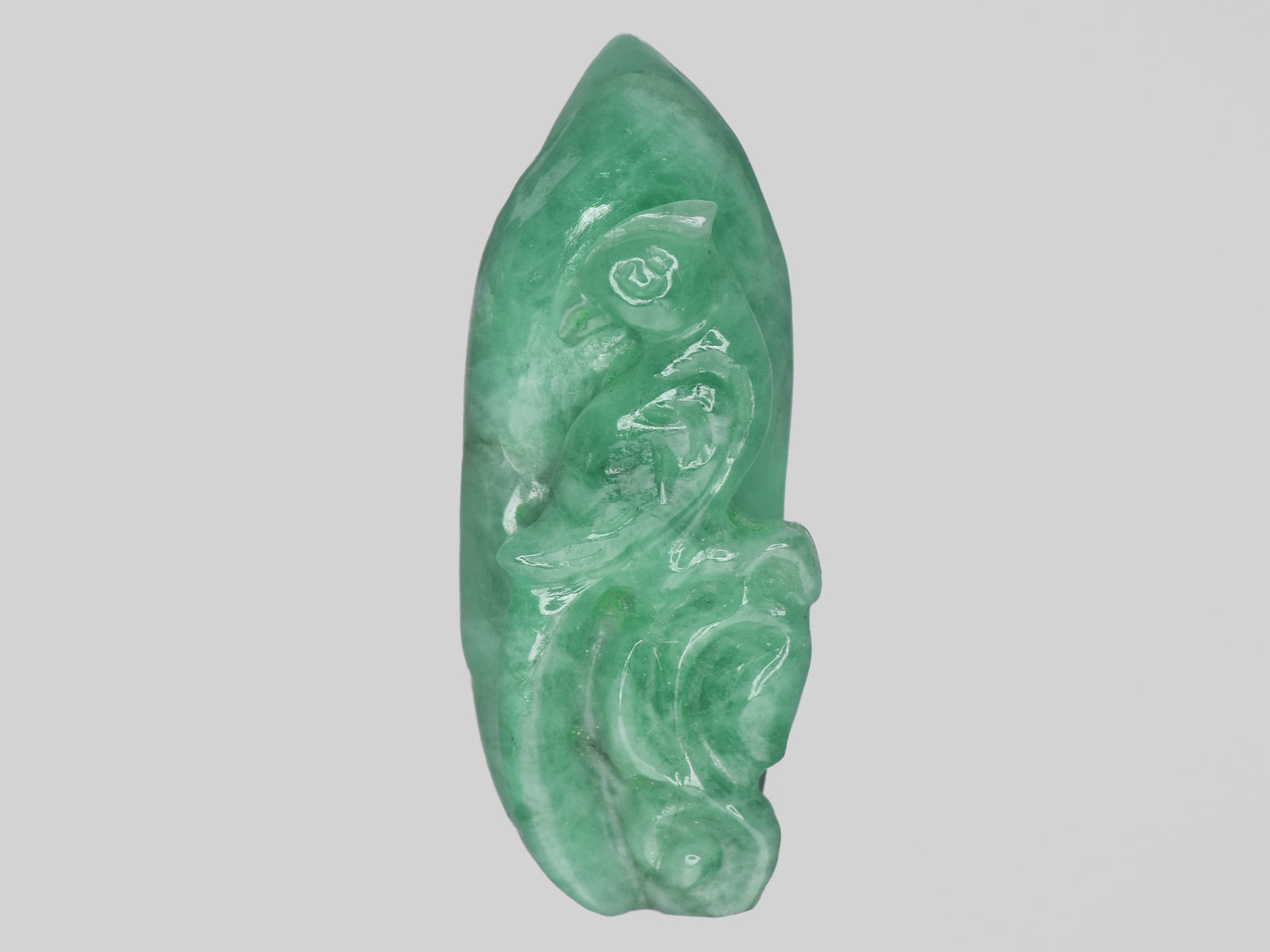 8801471-carved-light-green-gii-zambia-natural-emerald-15.15-ct