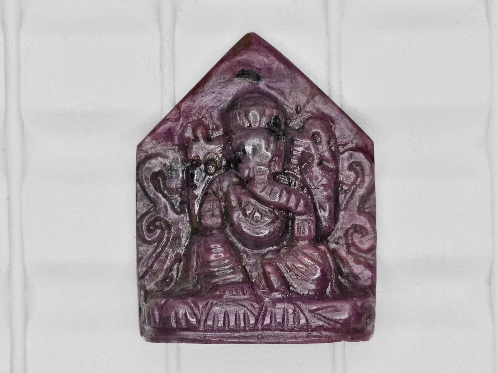 8801473-carved-purple-red-gii-india-natural-ruby-65.36-ct
