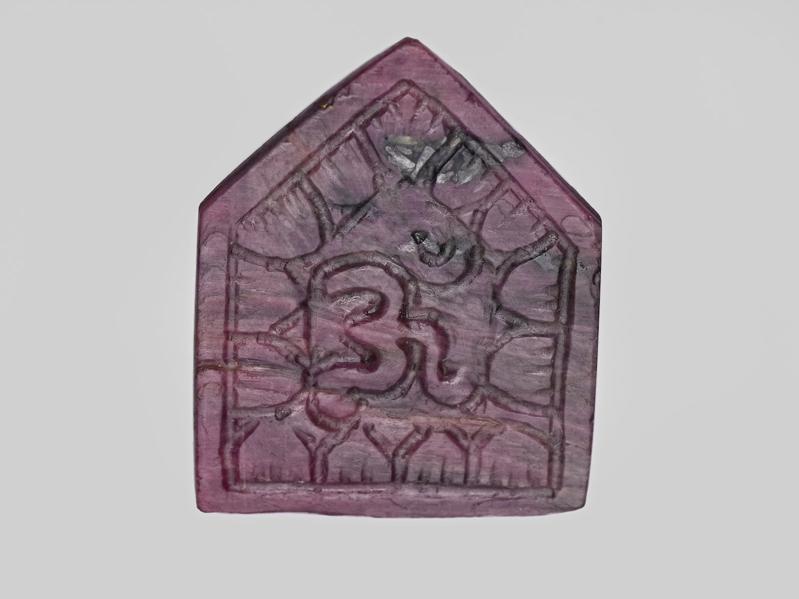 8801473-carved-purple-red-gii-india-natural-ruby-65.36-ct