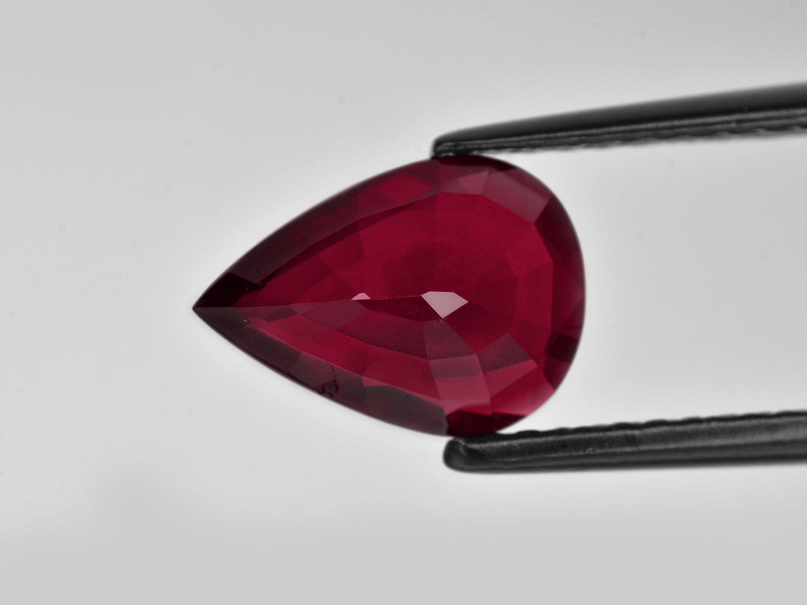 8801373-pear-intense-pigeon-blood-red-grs-mozambique-natural-ruby-2.61-ct