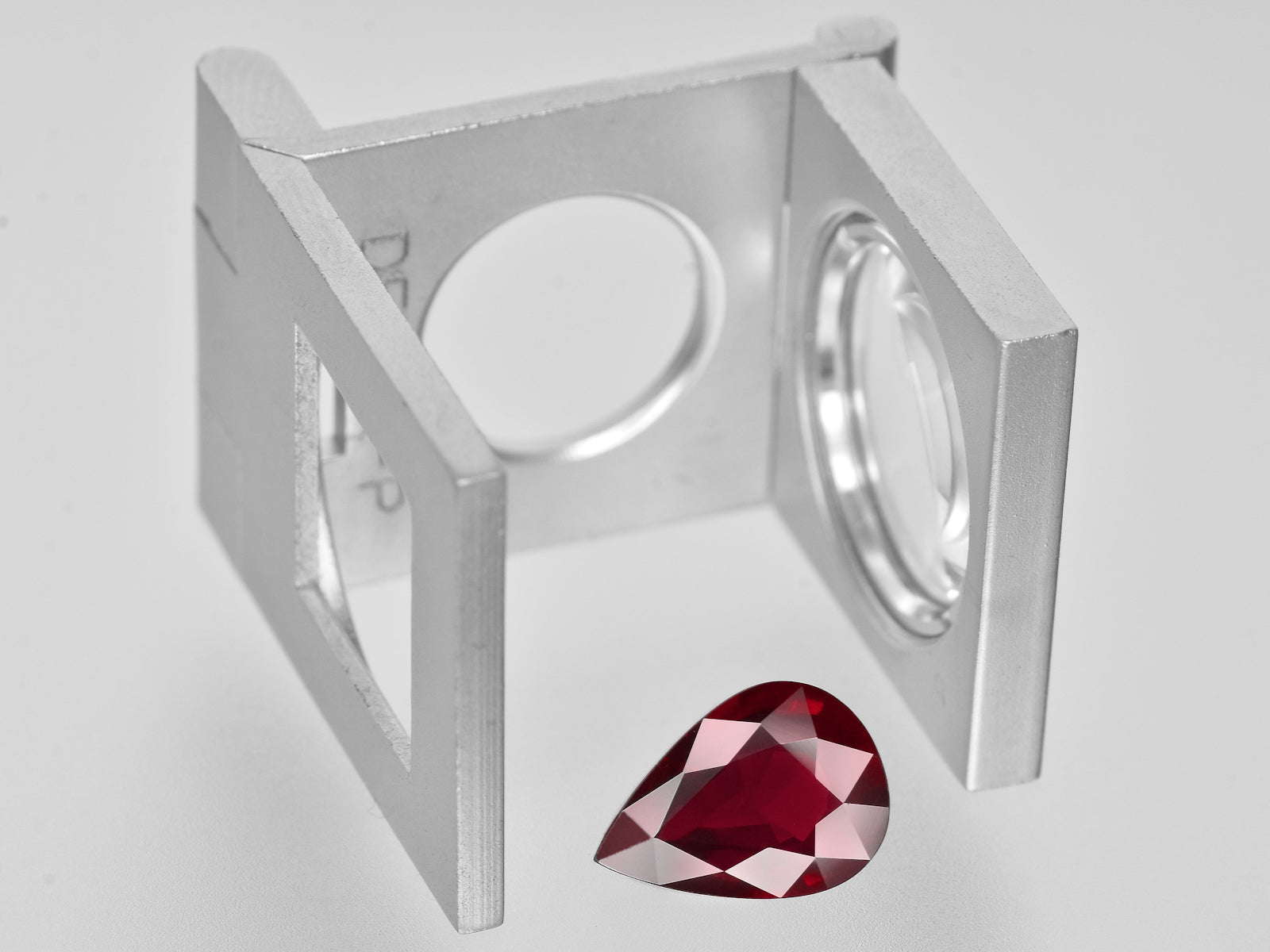 8801373-pear-intense-pigeon-blood-red-grs-mozambique-natural-ruby-2.61-ct