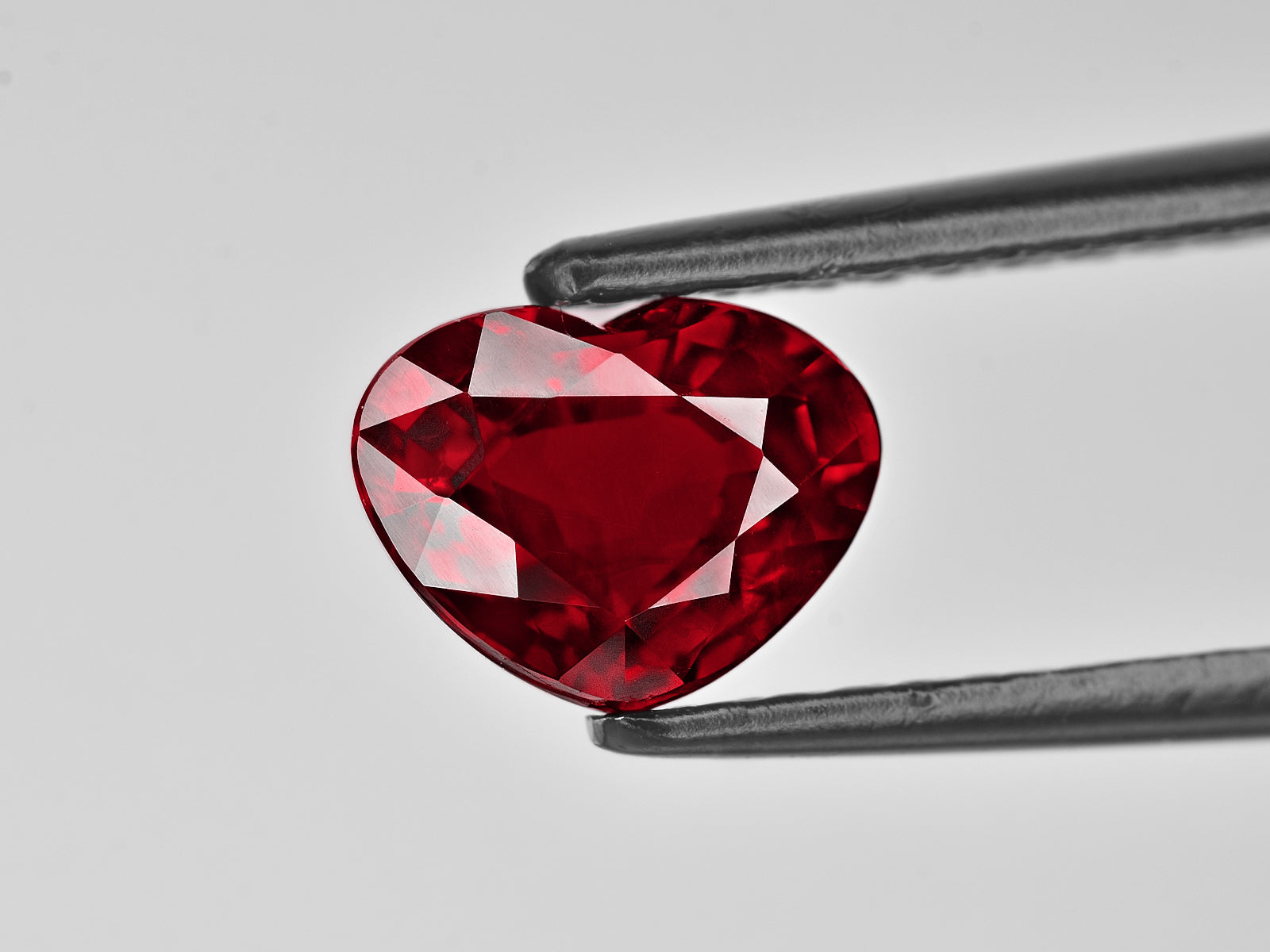 8801376-heart-fiery-vivid-pigeon-blood-red`-grs-mozambique-natural-ruby-2.07-ct