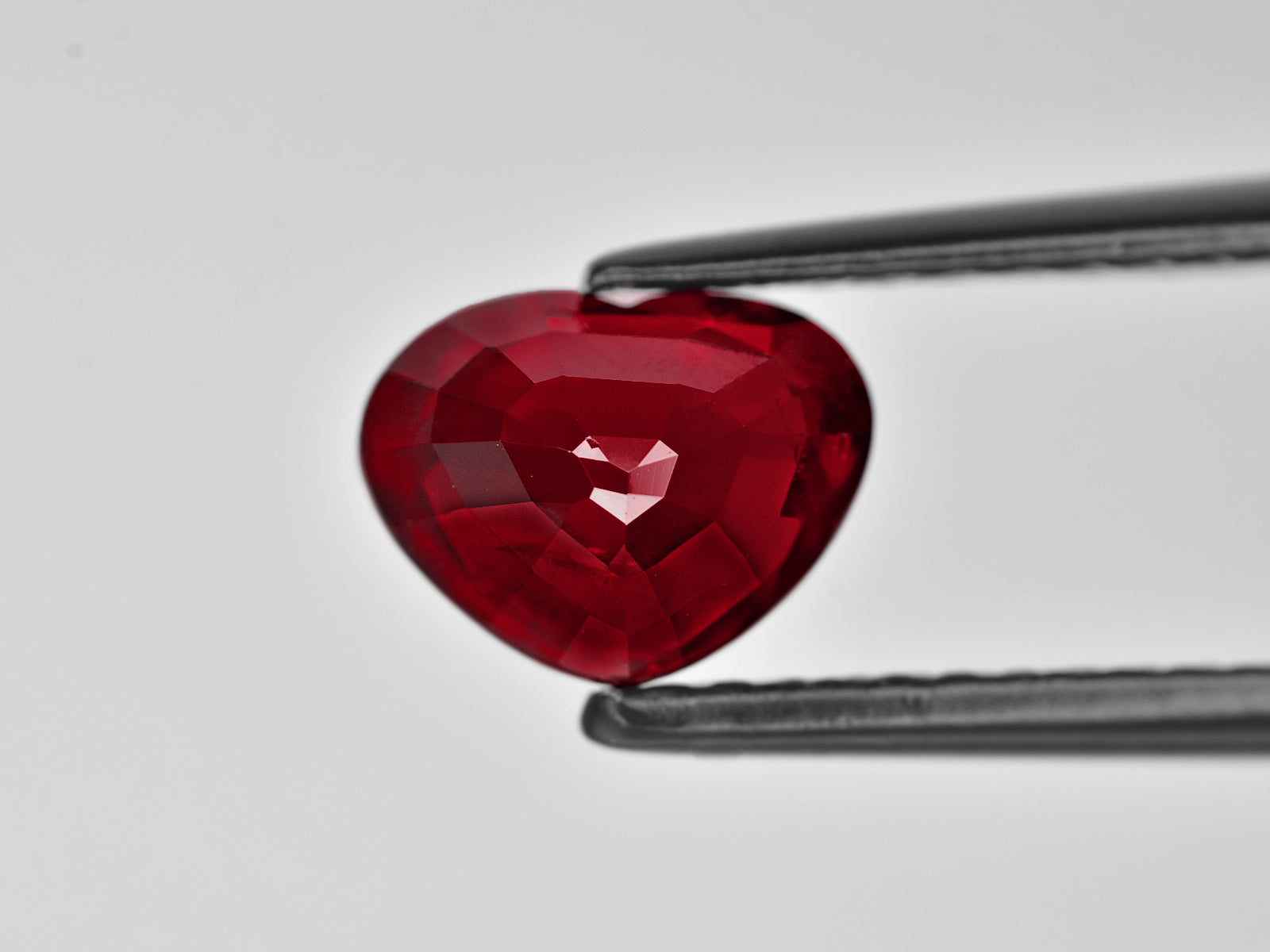 8801376-heart-fiery-vivid-pigeon-blood-red`-grs-mozambique-natural-ruby-2.07-ct