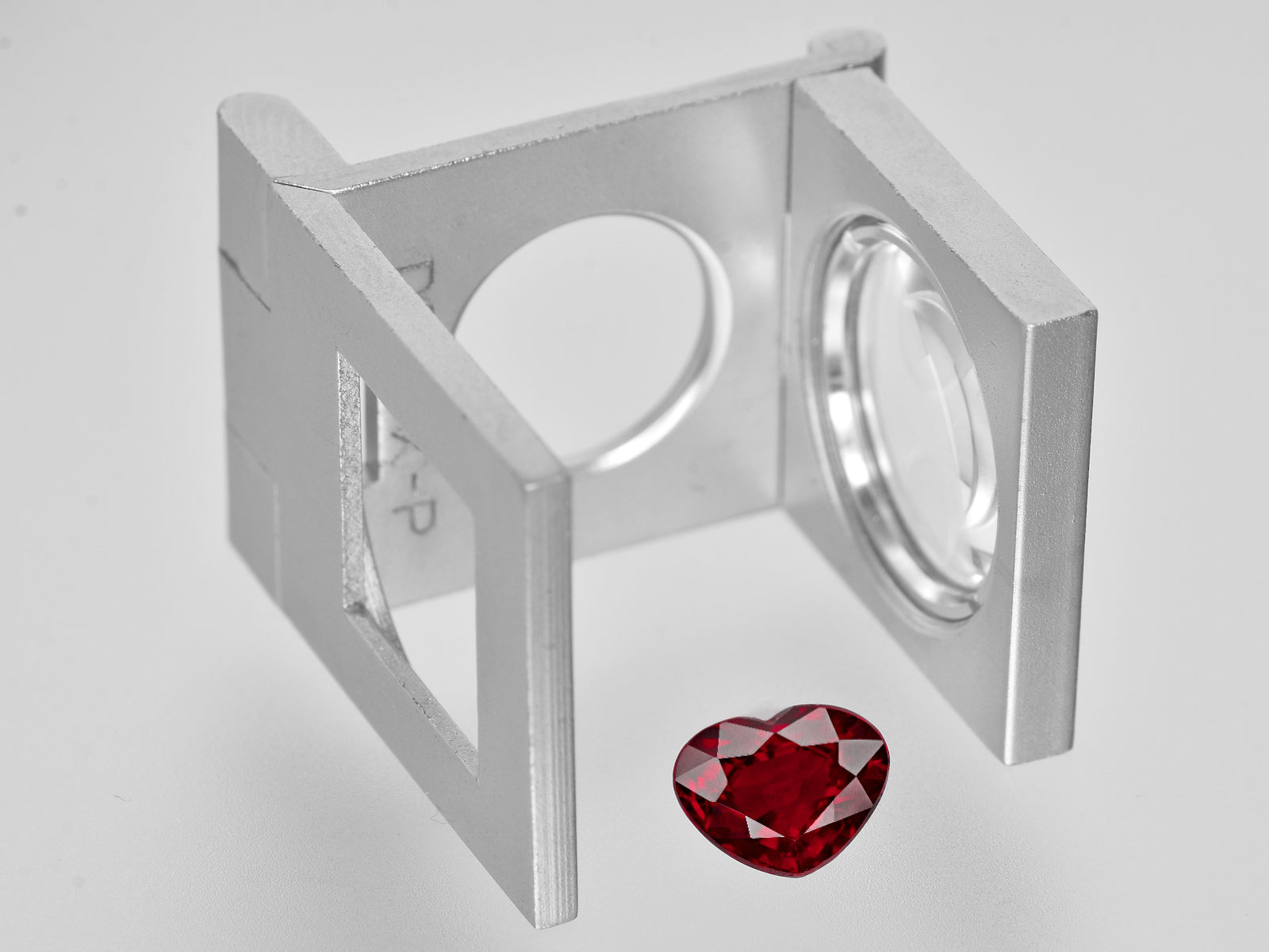 8801376-heart-fiery-vivid-pigeon-blood-red`-grs-mozambique-natural-ruby-2.07-ct