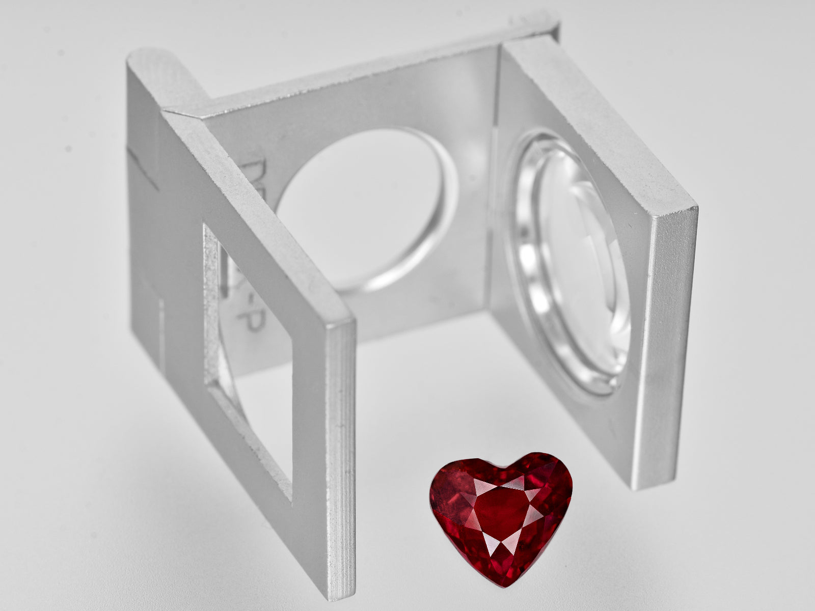 8801378-heart-intense-pigeon-blood-red-grs-mozambique-natural-ruby-3.15-ct