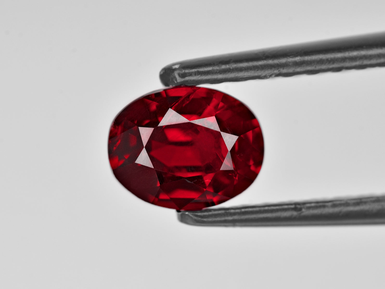 8801359-oval-fiery-intense-pigeon-blood-red-grs-mozambique-natural-ruby-1.20-ct