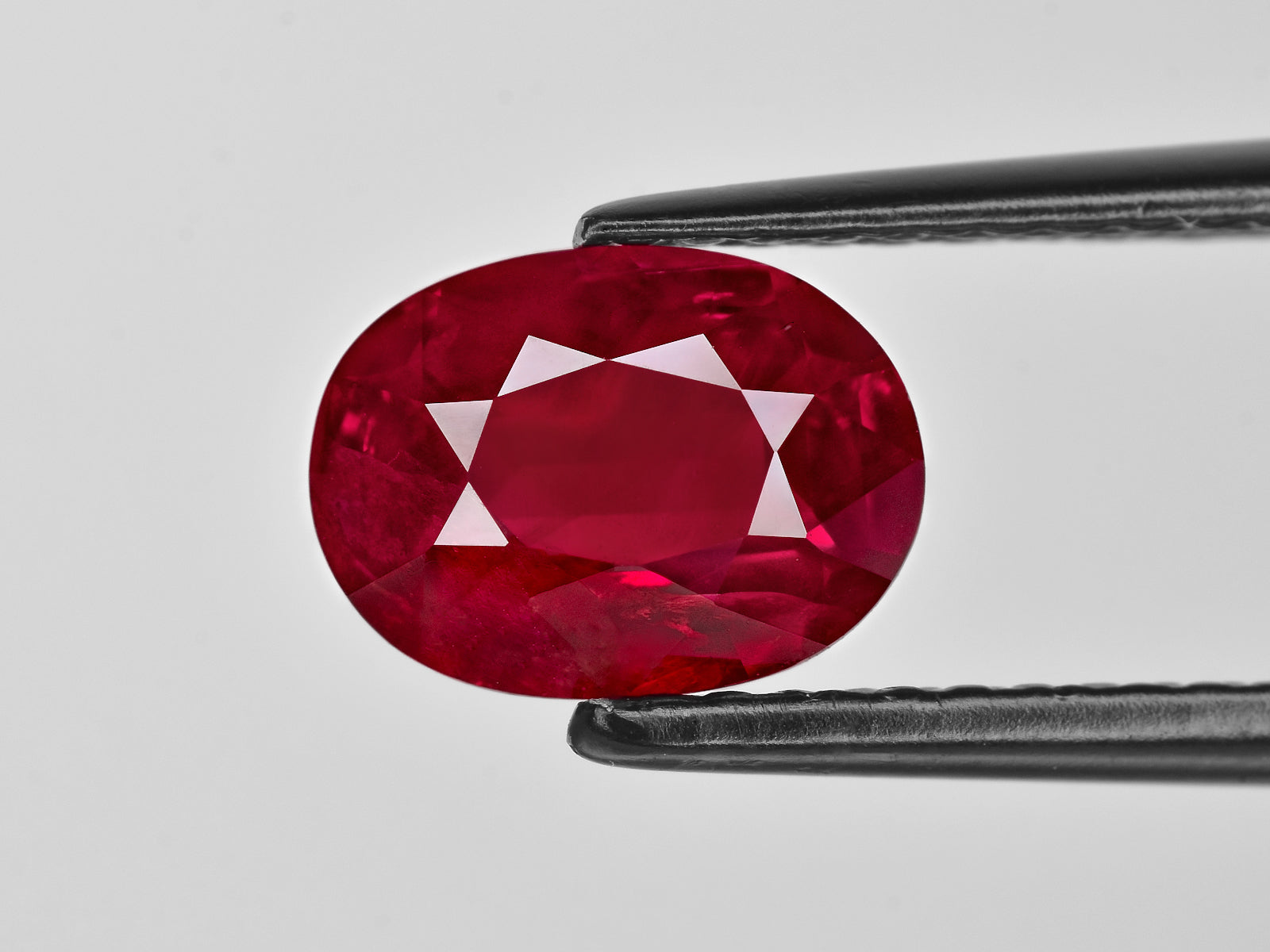 8801386-oval-velvety-pigeon-blood-red-grs-tanzania-natural-ruby-2.31-ct