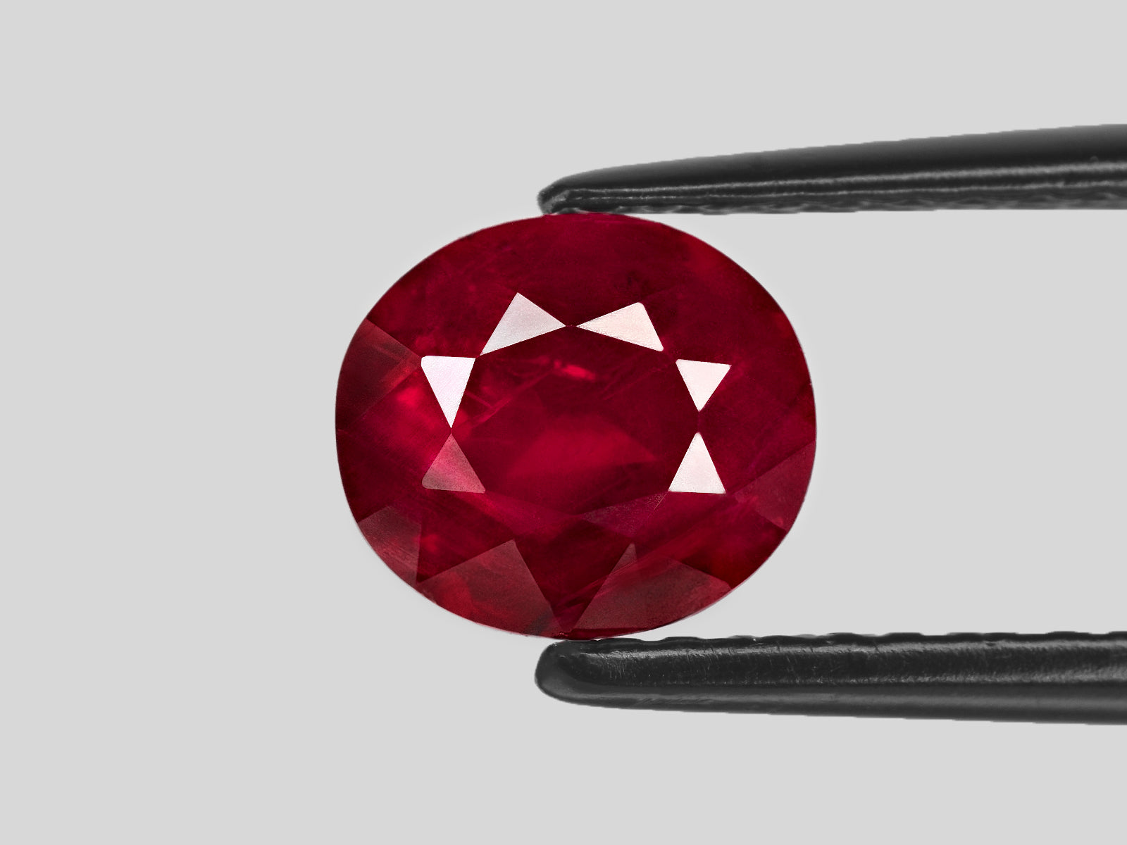 8801388-oval-fiery-rich-pigeon-blood-red-grs-tanzania-natural-ruby-2.03-ct