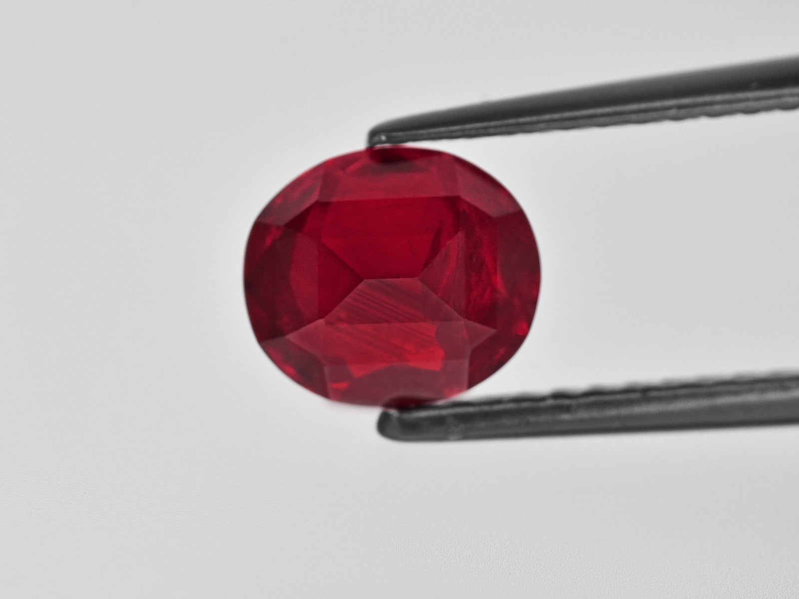 8801391-oval-fiery-deep-pigeon-blood-red-grs-tanzania-natural-ruby-2.40-ct