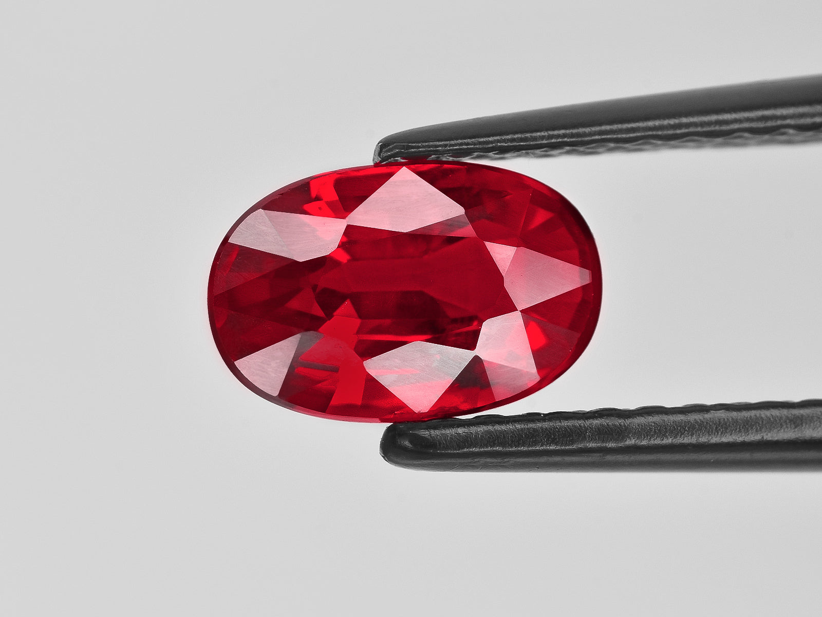 8801395-oval-vivid-neon-pigeon-blood-red-grs-mozambique-natural-ruby-2.02-ct