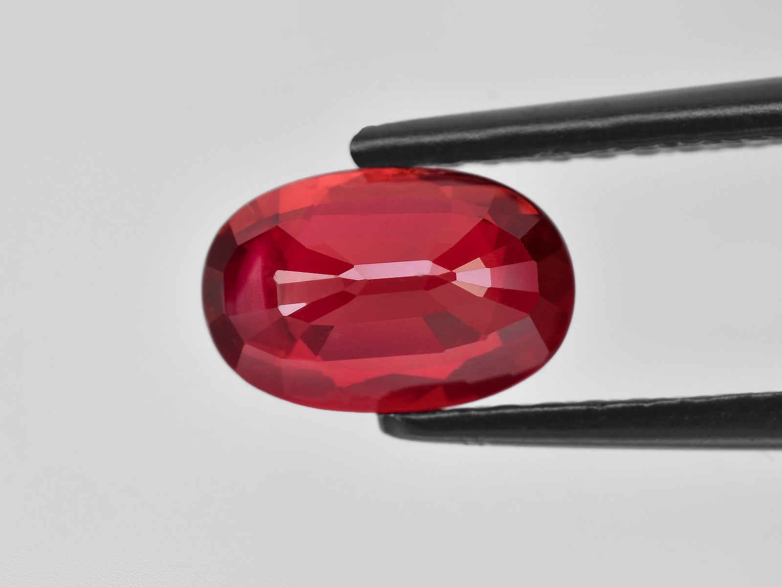8801395-oval-vivid-neon-pigeon-blood-red-grs-mozambique-natural-ruby-2.02-ct