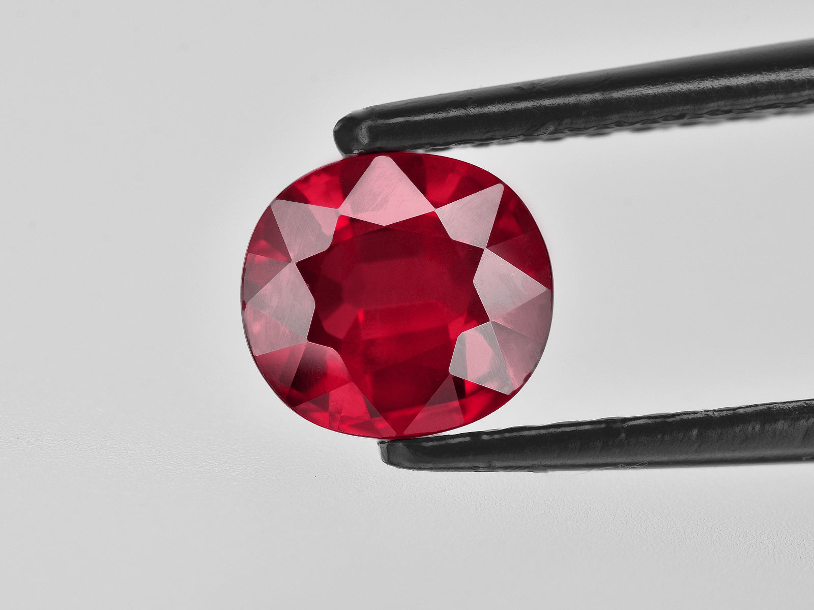8801398-oval-vivid-pigeon-blood-red-grs-mozambique-natural-ruby-2.04-ct