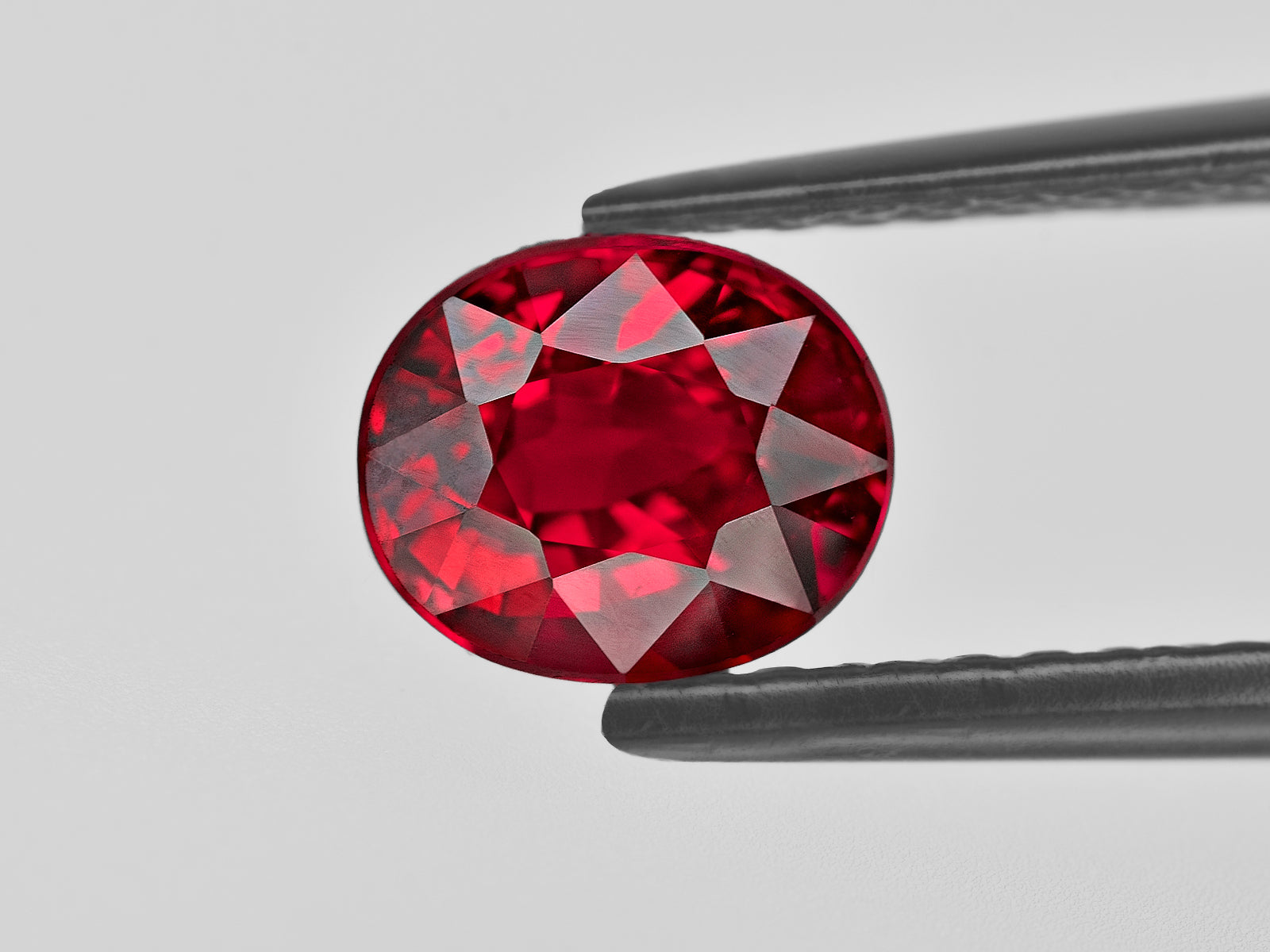 8801399-oval-fiery-vivid-pigeon-blood-red-grs-mozambique-natural-ruby-2.04-ct