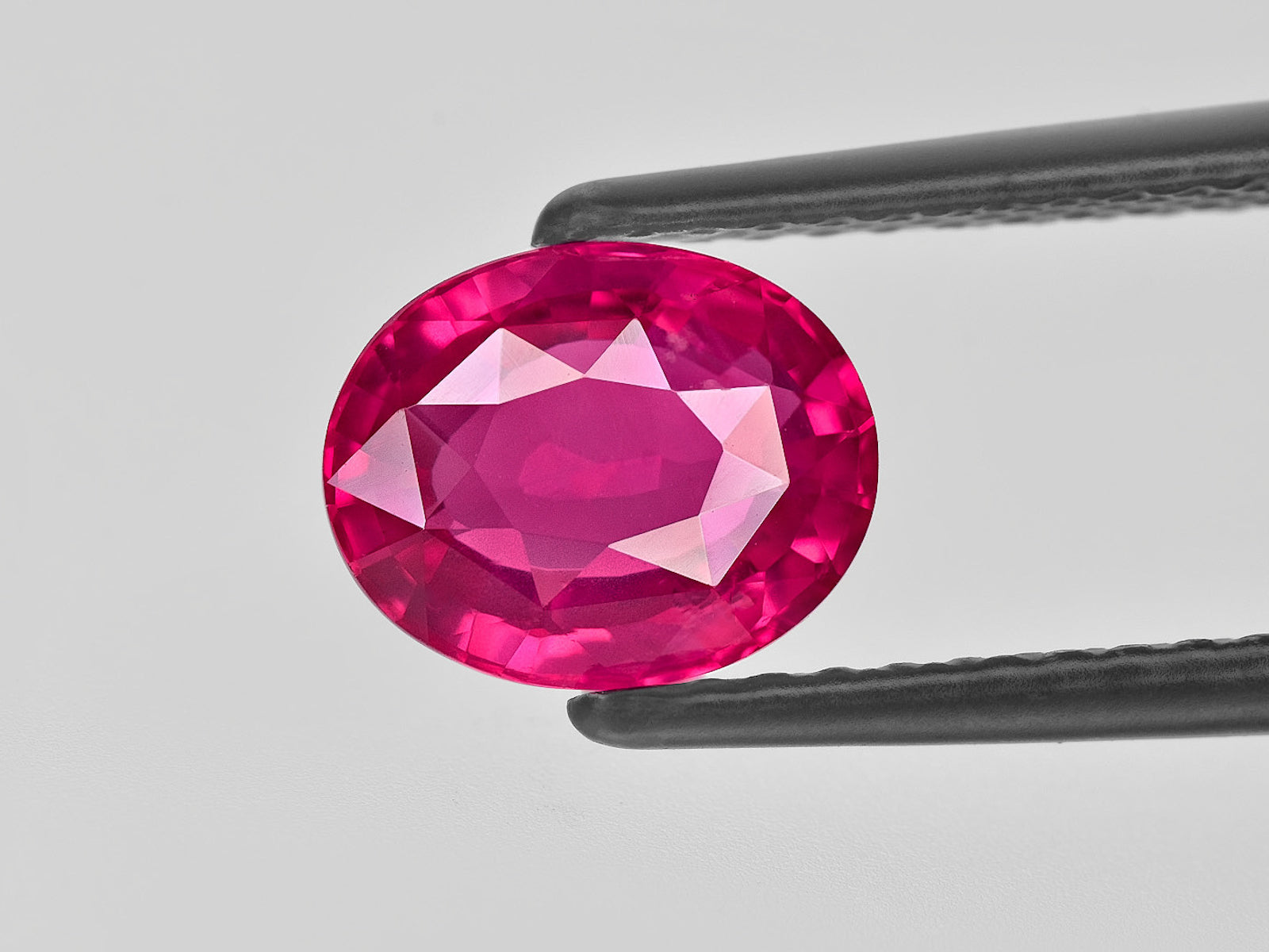 8801846-oval-lustrous-pinkish-red-grs-mozambique-natural-ruby-2.52-ct