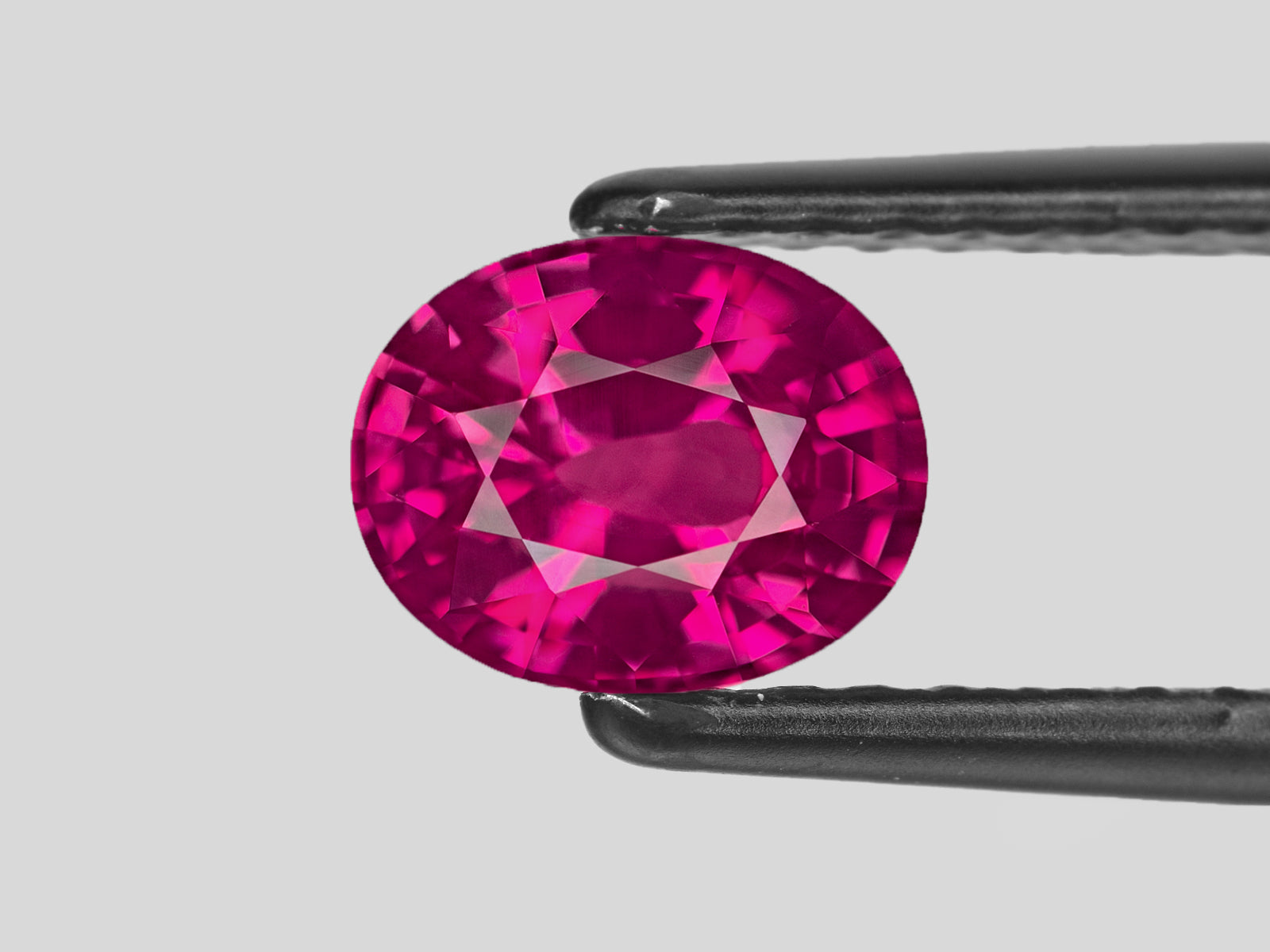 8801847-oval-fiery-rich-pinkish-red-grs-sri-lanka-natural-ruby-1.57-ct
