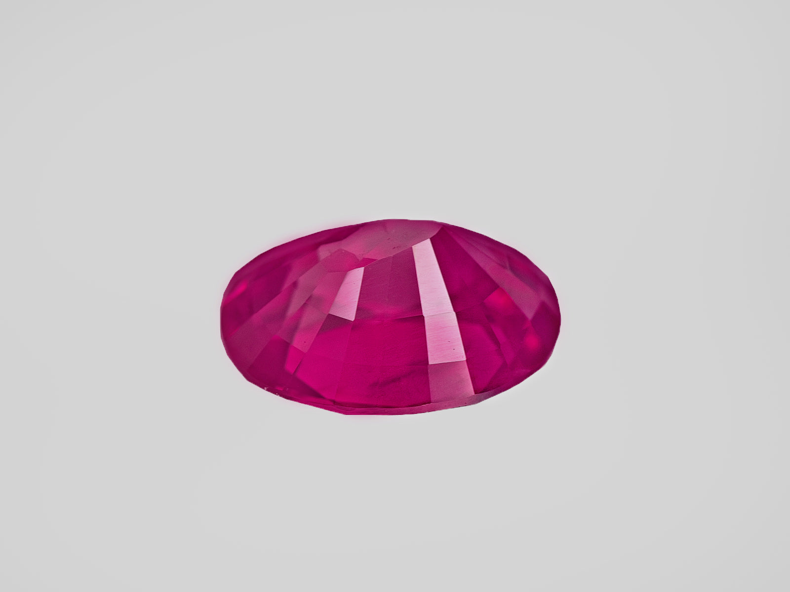 8801847-oval-fiery-rich-pinkish-red-grs-sri-lanka-natural-ruby-1.57-ct