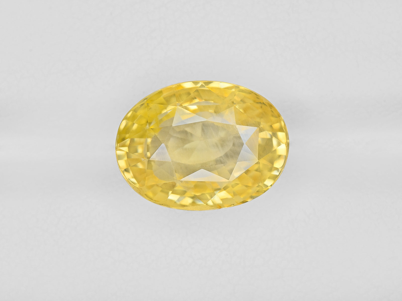 8801526-oval-lustrous-intense-yellow-igi-sri-lanka-natural-yellow-sapphire-9.03-ct
