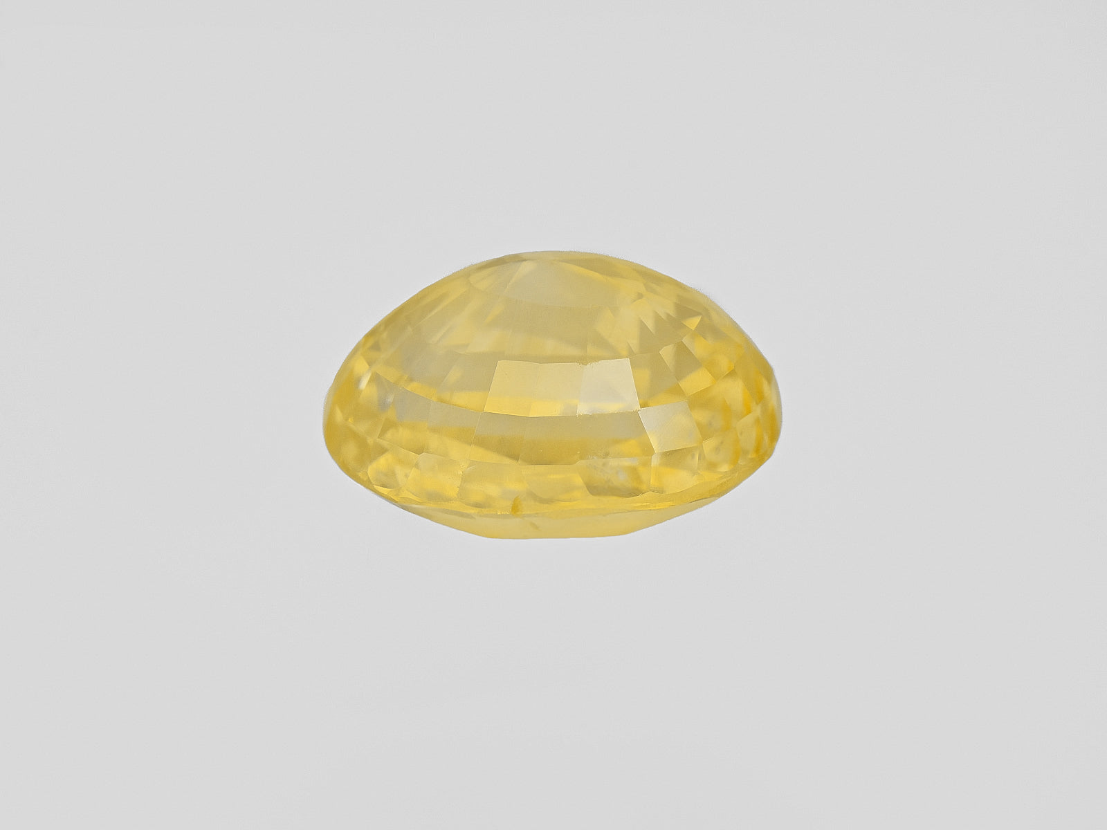 8801526-oval-lustrous-intense-yellow-igi-sri-lanka-natural-yellow-sapphire-9.03-ct