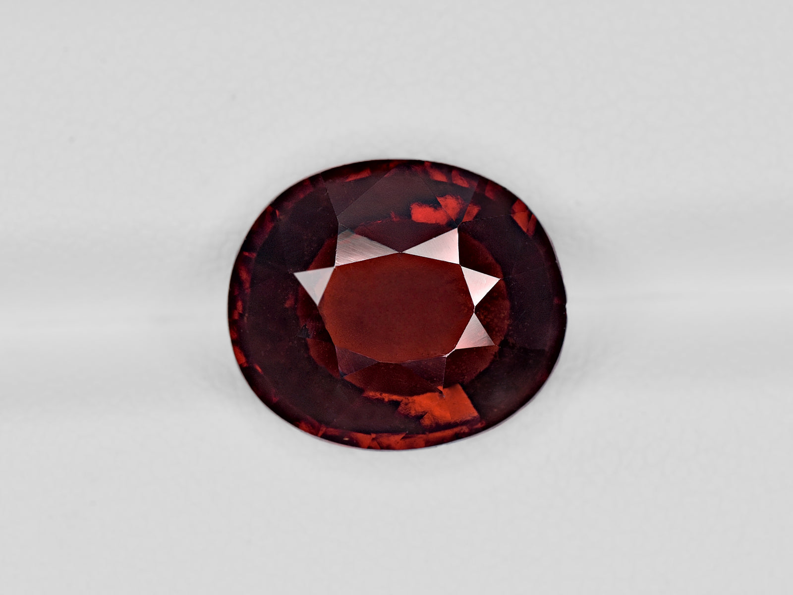 8801486-oval-brownish-red-igi-sri-lanka-natural-hessonite-garnet-7.42-ct
