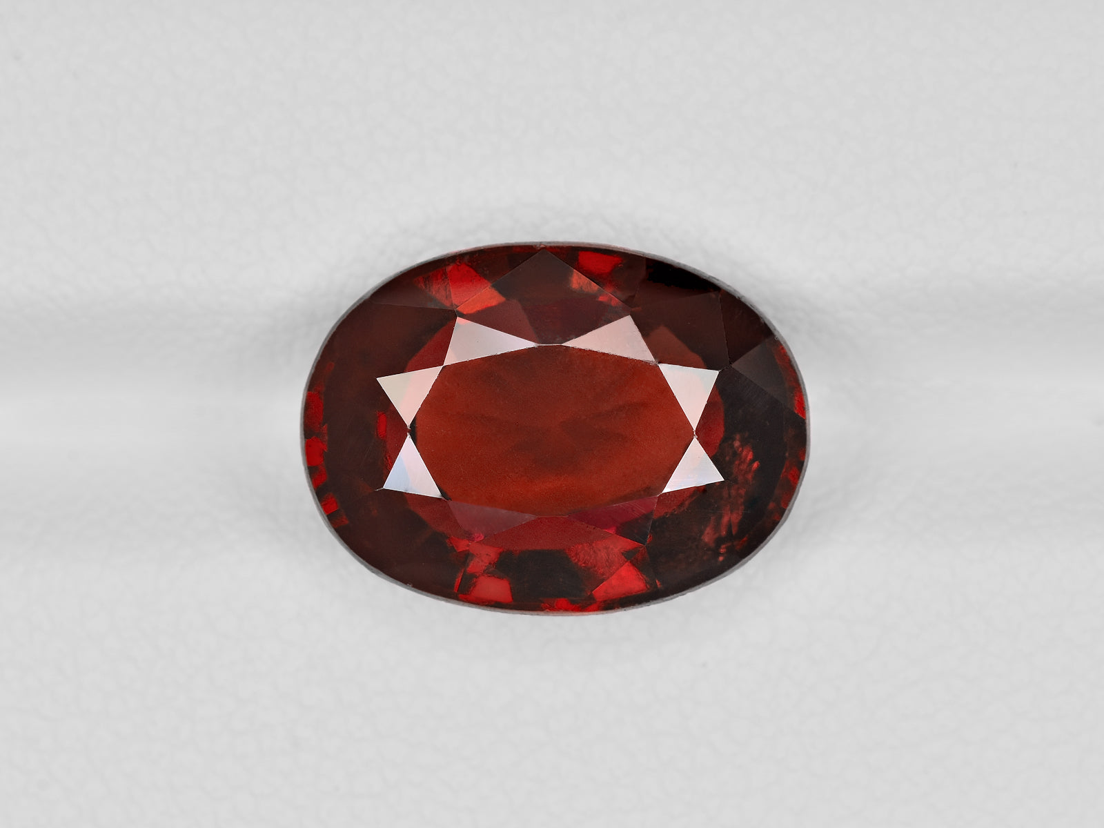 8801500-oval-brownish-red-igi-sri-lanka-natural-hessonite-garnet-7.63-ct
