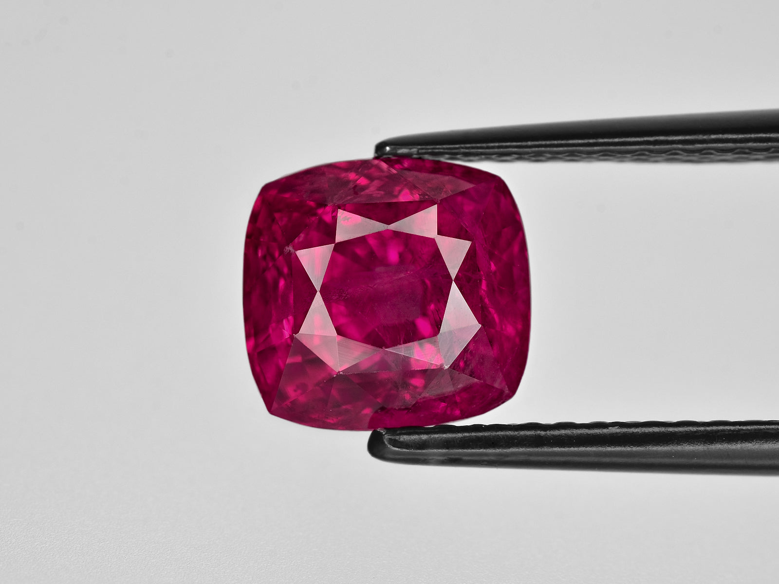 8801476-cushion-rich-deep-pinkish-red-gia-tanzania-natural-ruby-5.21-ct