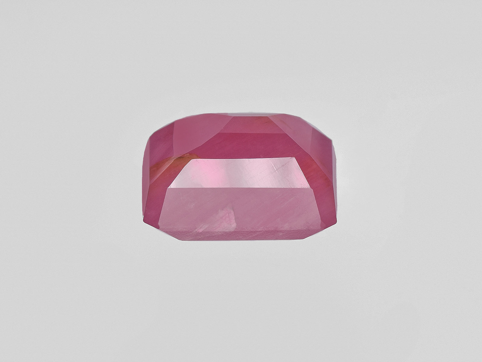 8801704-octagonal-pink-red-with-orange-staining-igi-guinea-natural-ruby-13.33-ct