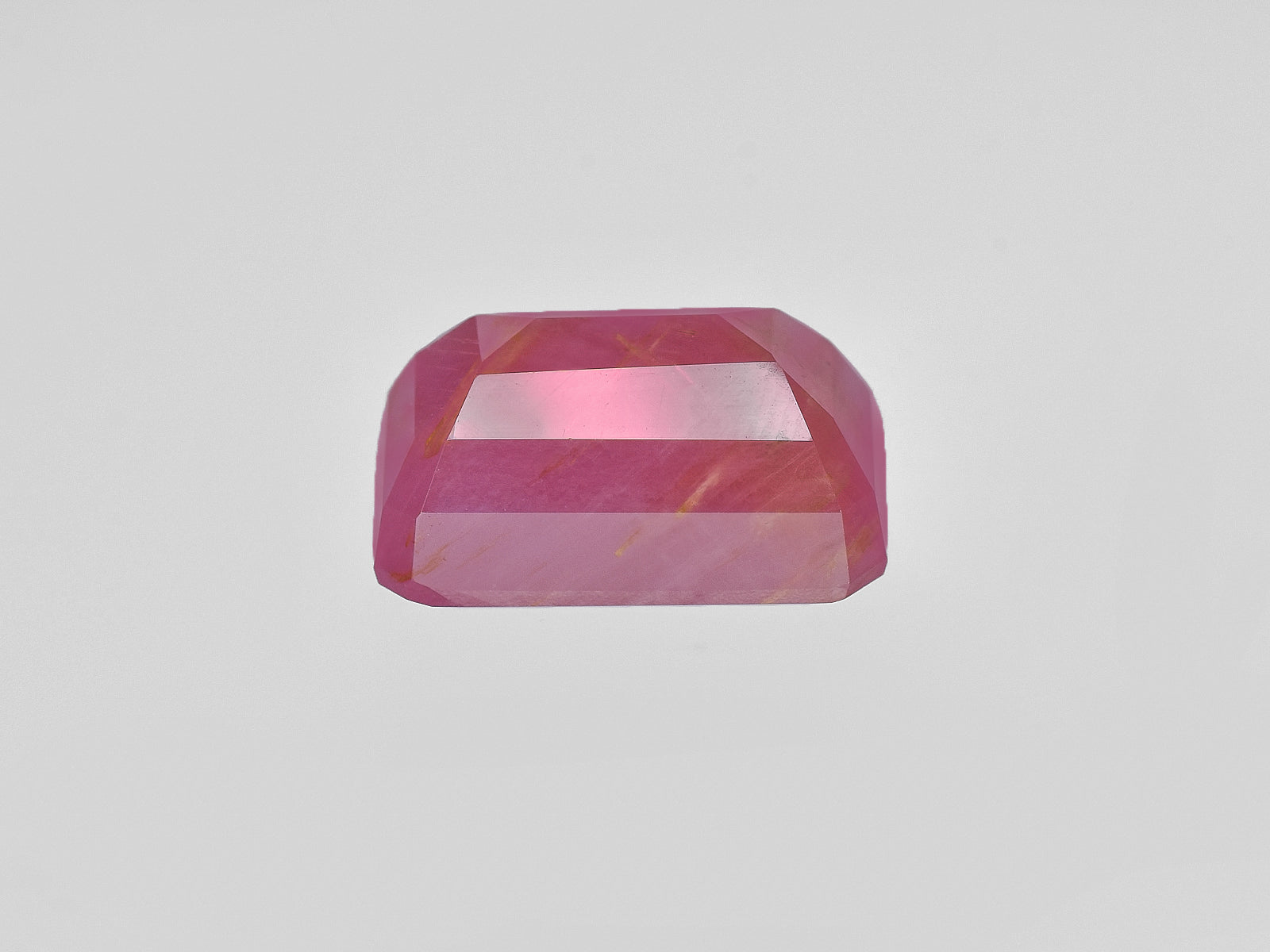 8801706-octagonal-pink-red-with-orange-staining-igi-guinea-natural-ruby-13.14-ct