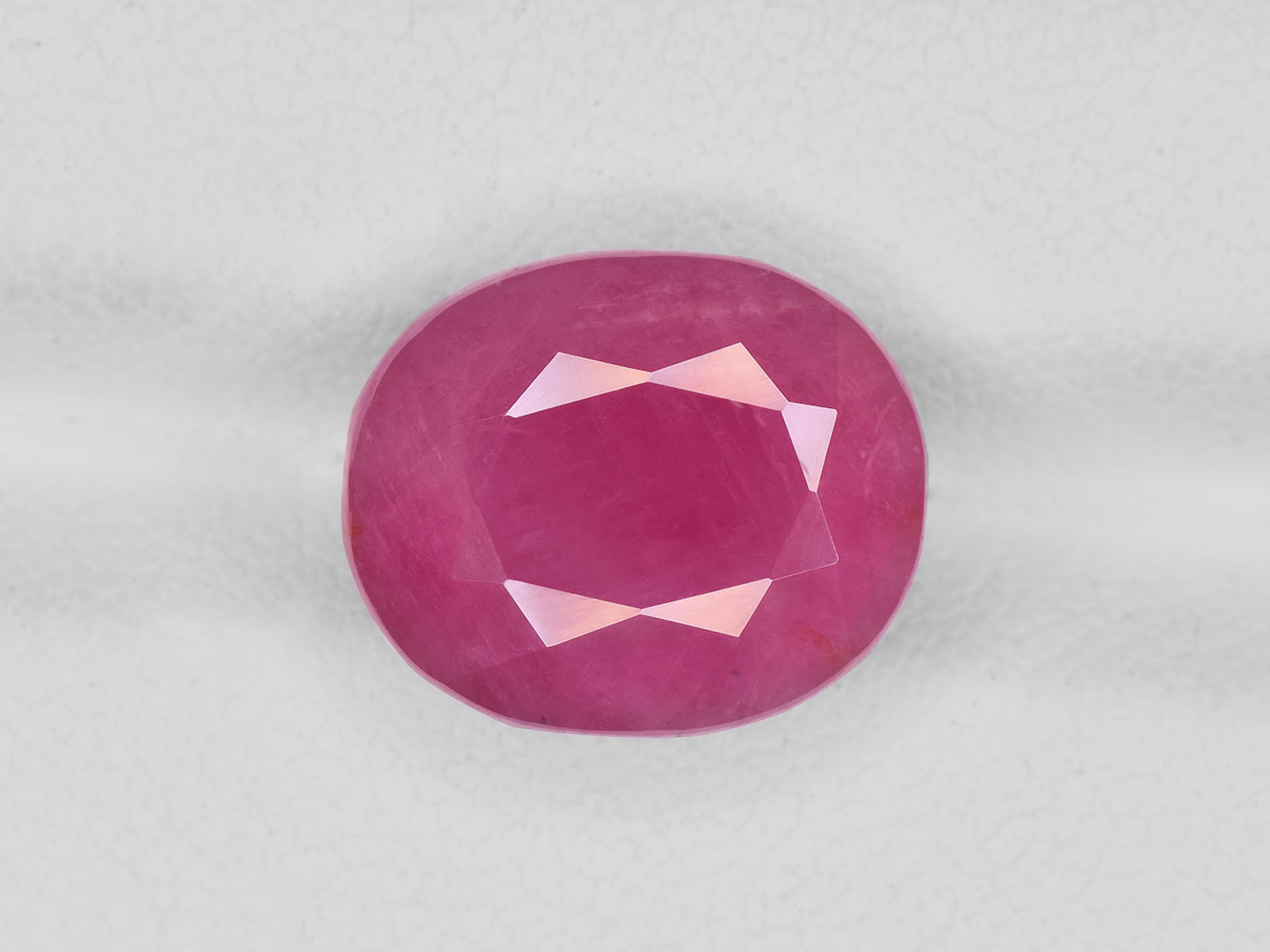 8801716-oval-bright-pink-red-igi-guinea-natural-ruby-8.33-ct