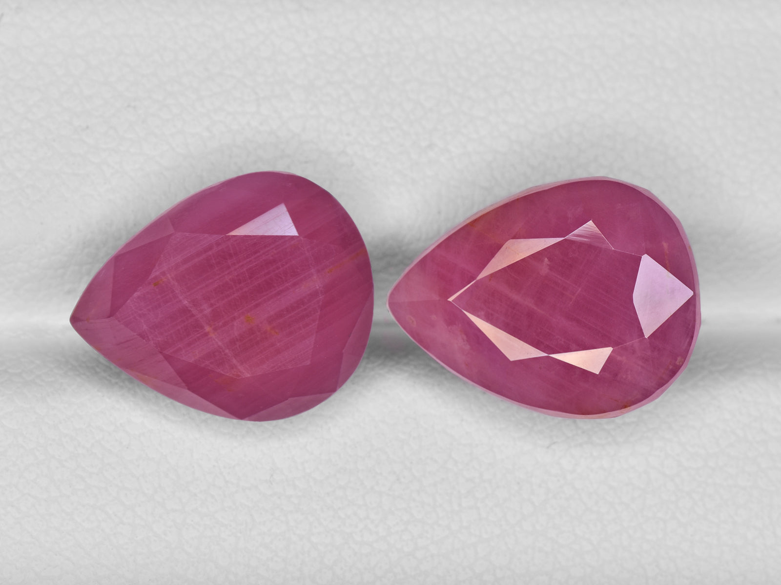 8801721-pear-pink-red-igi-guinea-natural-ruby-22.79-ct