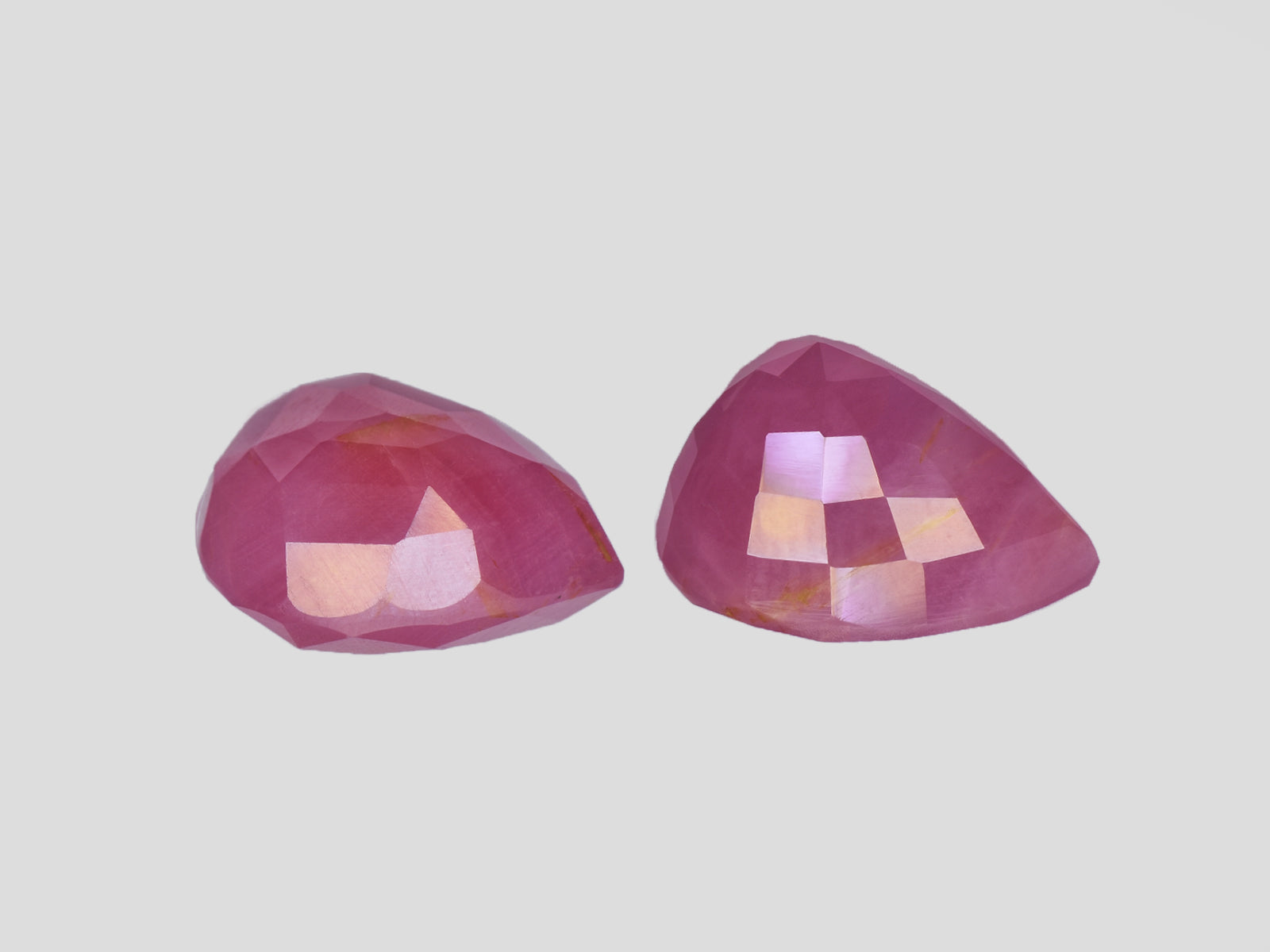 8801721-pear-pink-red-igi-guinea-natural-ruby-22.79-ct