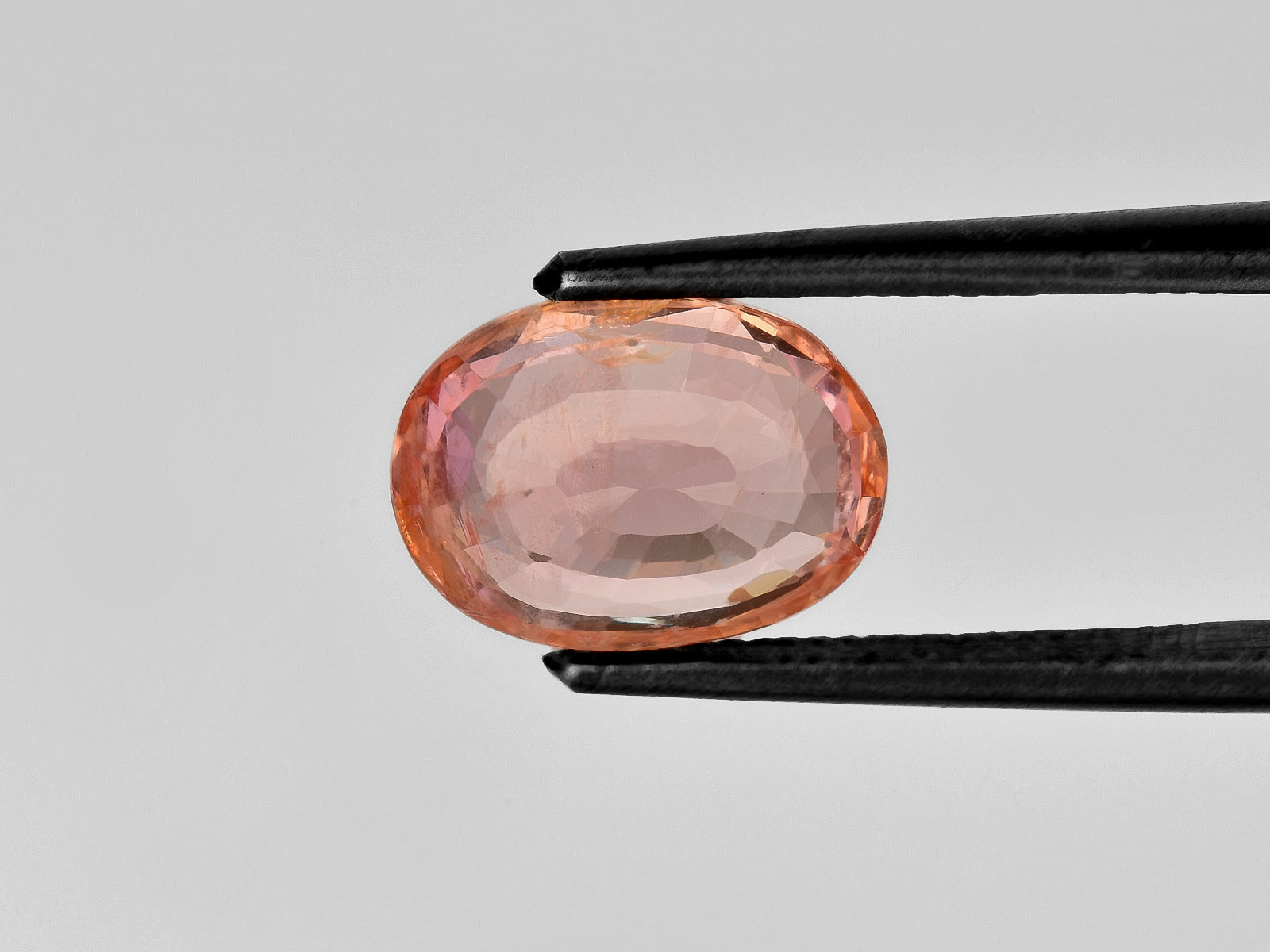 8801670-oval-intense-pinkish-orange-aigs-sri-lanka-natural-padparadscha-3.78-ct