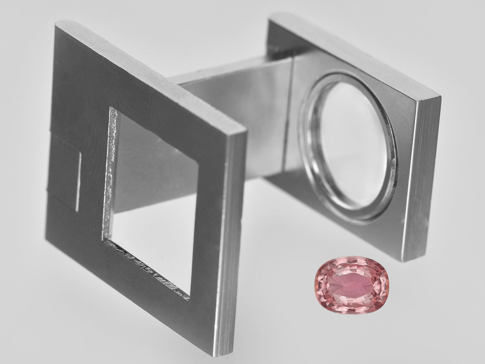 8801676-oval-orangy-pink-gia-madagascar-natural-padparadscha-1.44-ct