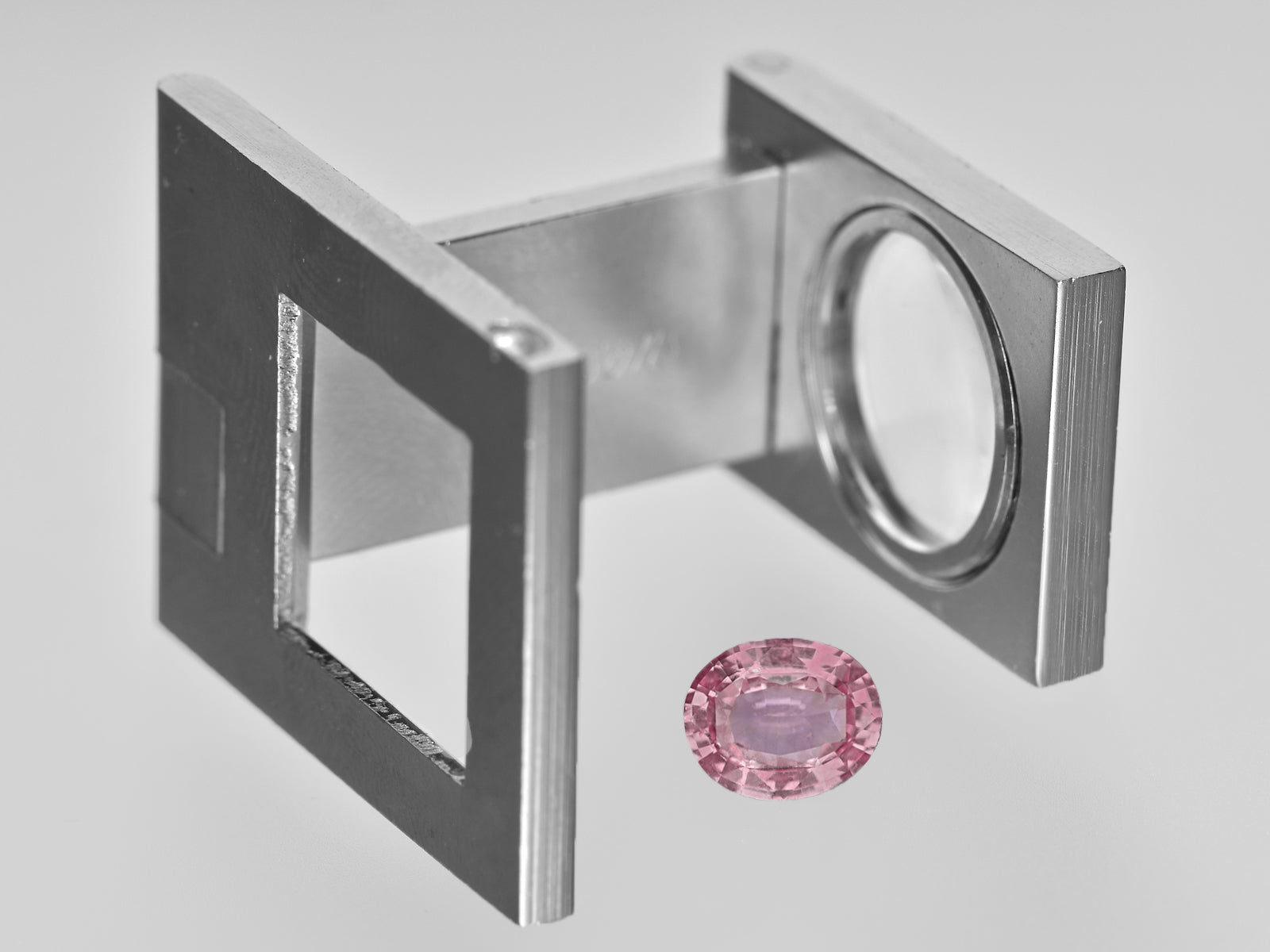 8801678-oval-lustrous-orangy-pink-gia-madagascar-natural-padparadscha-1.38-ct