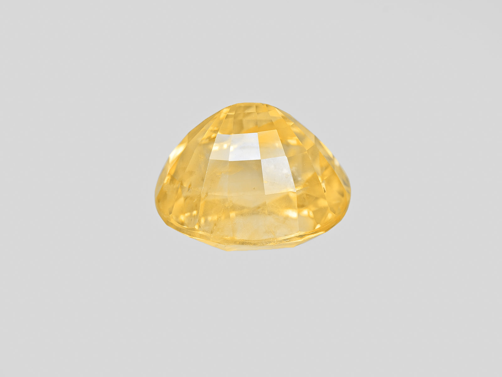 8802072-oval-lustrous-intense-yellow-grs-sri-lanka-natural-yellow-sapphire-12.12-ct