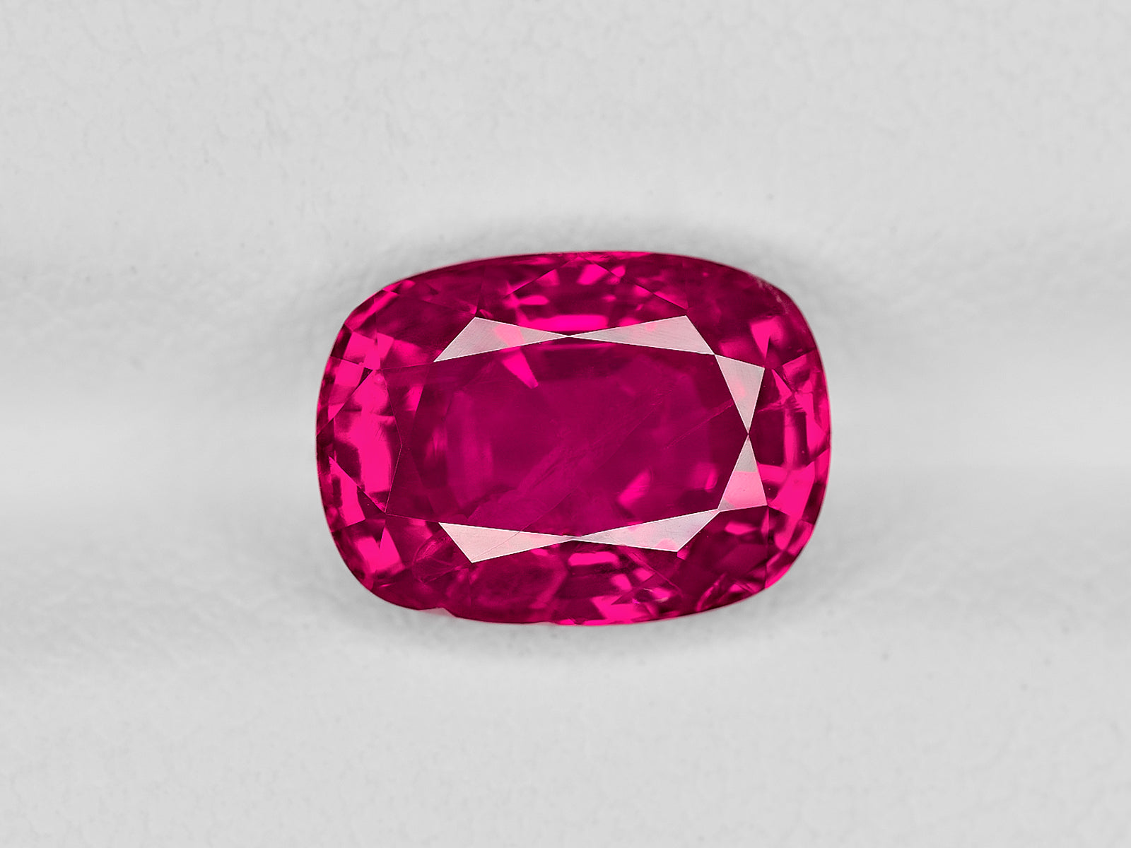 8801771-cushion-fiery-vivid-pinkish-red-gii-burma-natural-ruby-3.12-ct