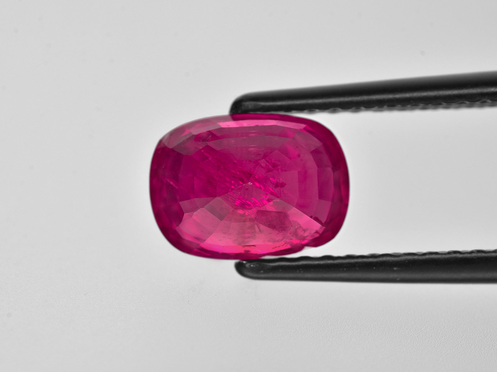8801771-cushion-fiery-vivid-pinkish-red-gii-burma-natural-ruby-3.12-ct