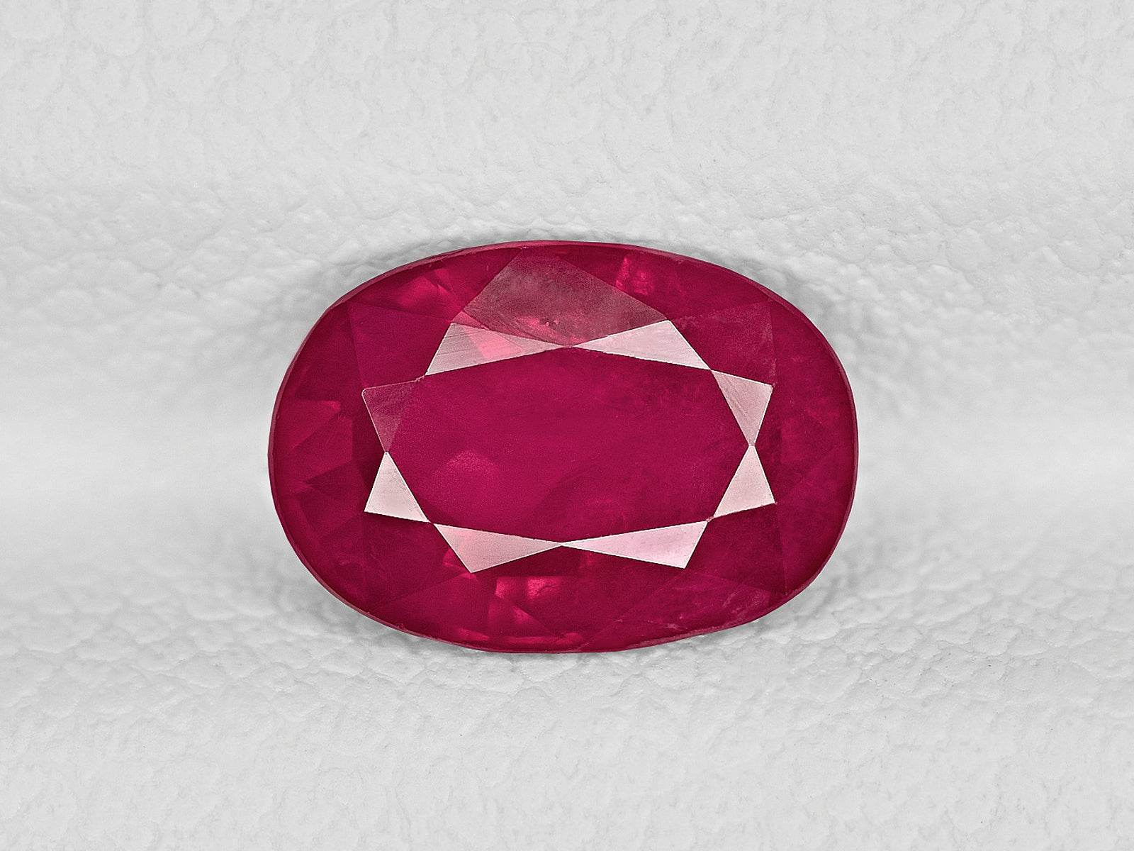 8801865-oval-deep-pinkish-red-igi-afghanistan-natural-ruby-1.59-ct