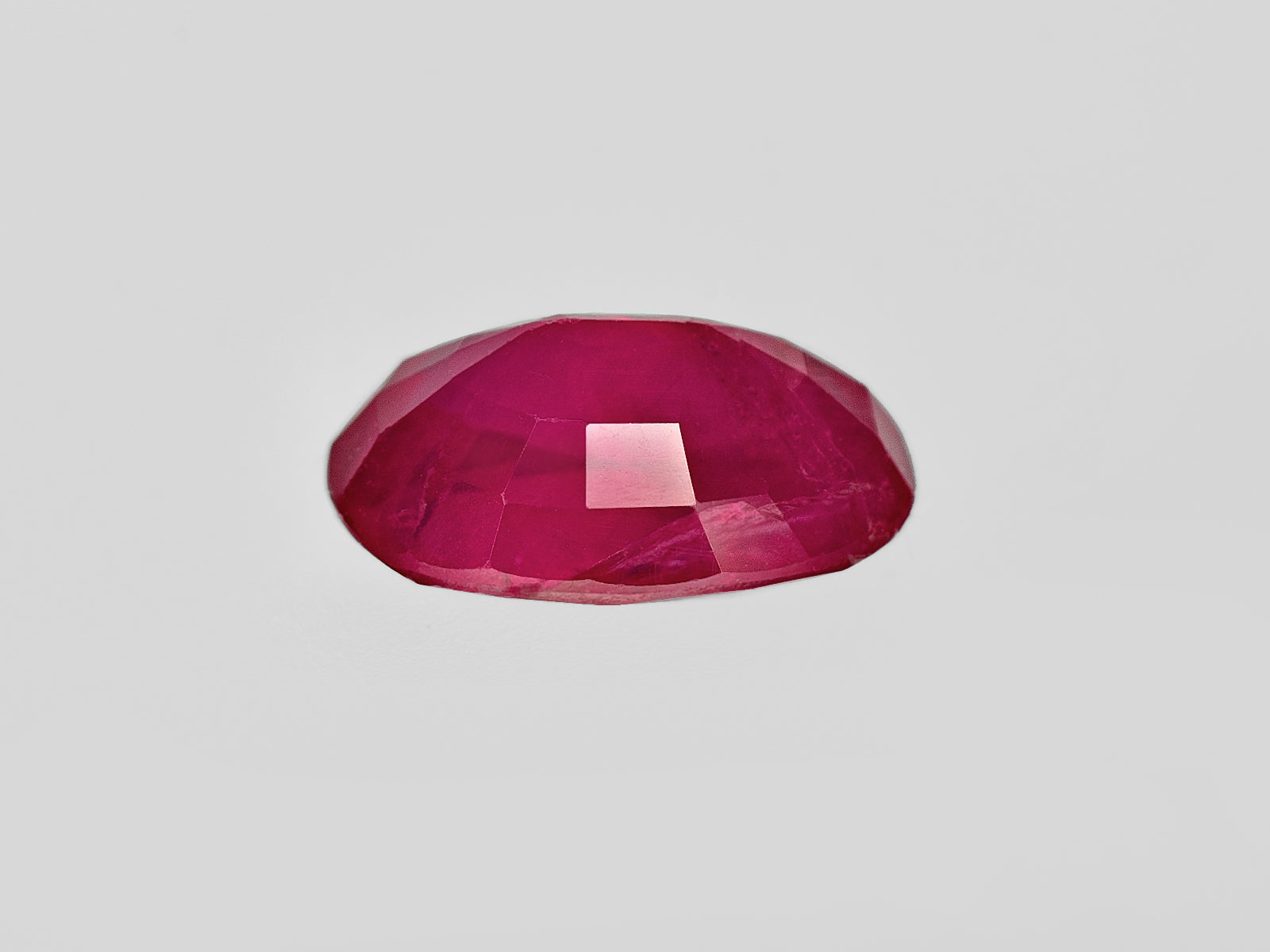 8801865-oval-deep-pinkish-red-igi-afghanistan-natural-ruby-1.59-ct