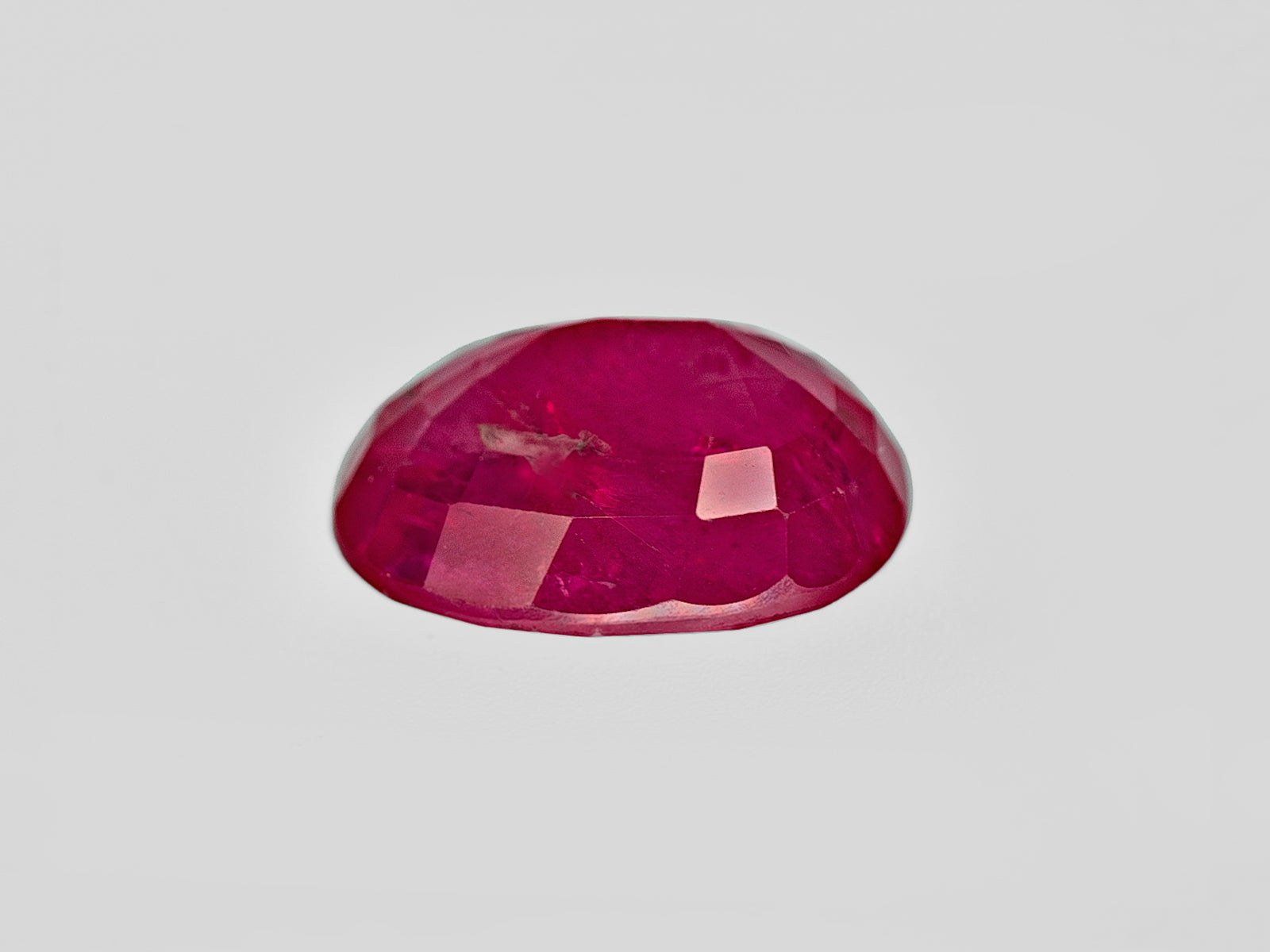 8801869-oval-pinkish-red-igi-afghanistan-natural-ruby-1.99-ct