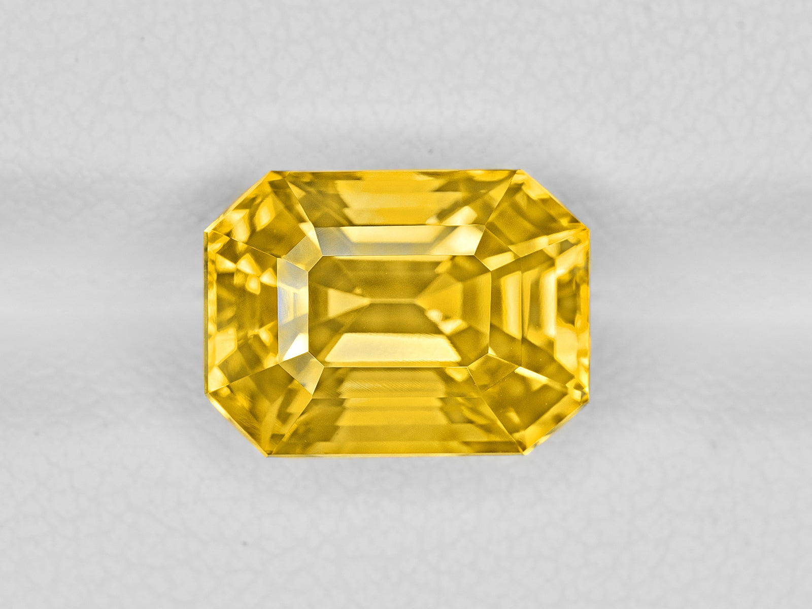 8801825-octagonal-fiery-rich-intense-yelow-sri-lanka-natural-yellow-sapphire-7.64-ct