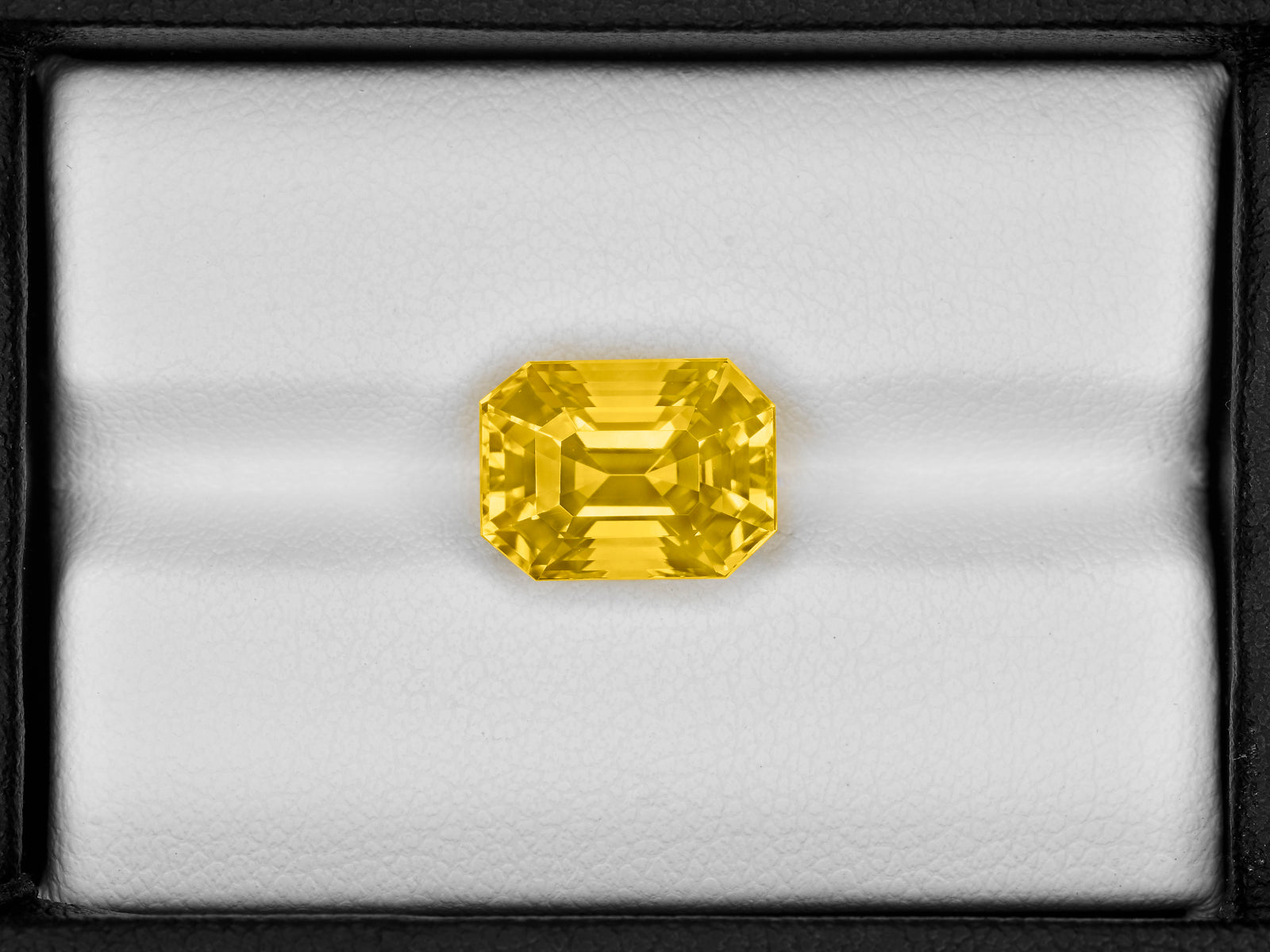 8801825-octagonal-fiery-rich-intense-yelow-sri-lanka-natural-yellow-sapphire-7.64-ct
