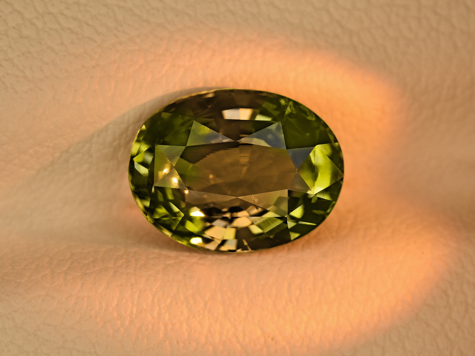 8801951-oval-lively-yellowish-green-changing-to-reddish-brown-igi-gii-madagascar-natural-alexandrite-2.56-ct