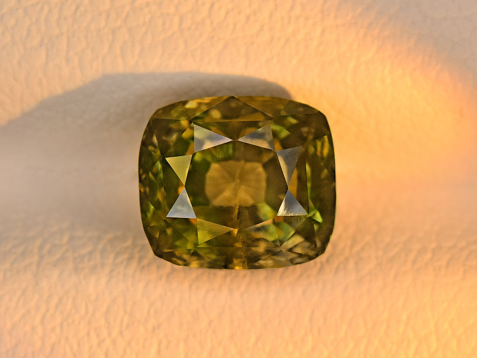 8801952-cushion-fiery-yellowish-green-changing-to-yellowish-brown-igi-gii-madagascar-natural-alexandrite-2.68-ct