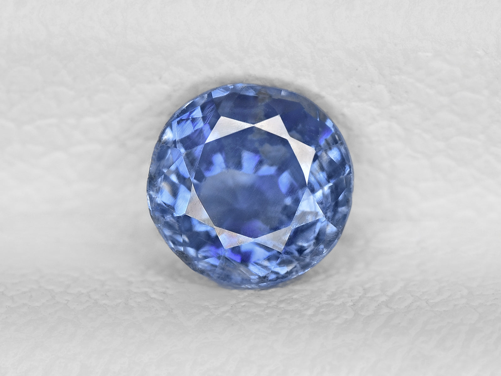 8801919-round-lustrous-blue-gia-igi-kashmir-natural-blue-sapphire-0.62-ct