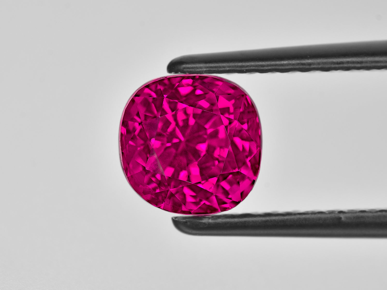 8801921-cushion-fiery-vivid-pinkish-red-burma-natural-ruby-3.01-ct