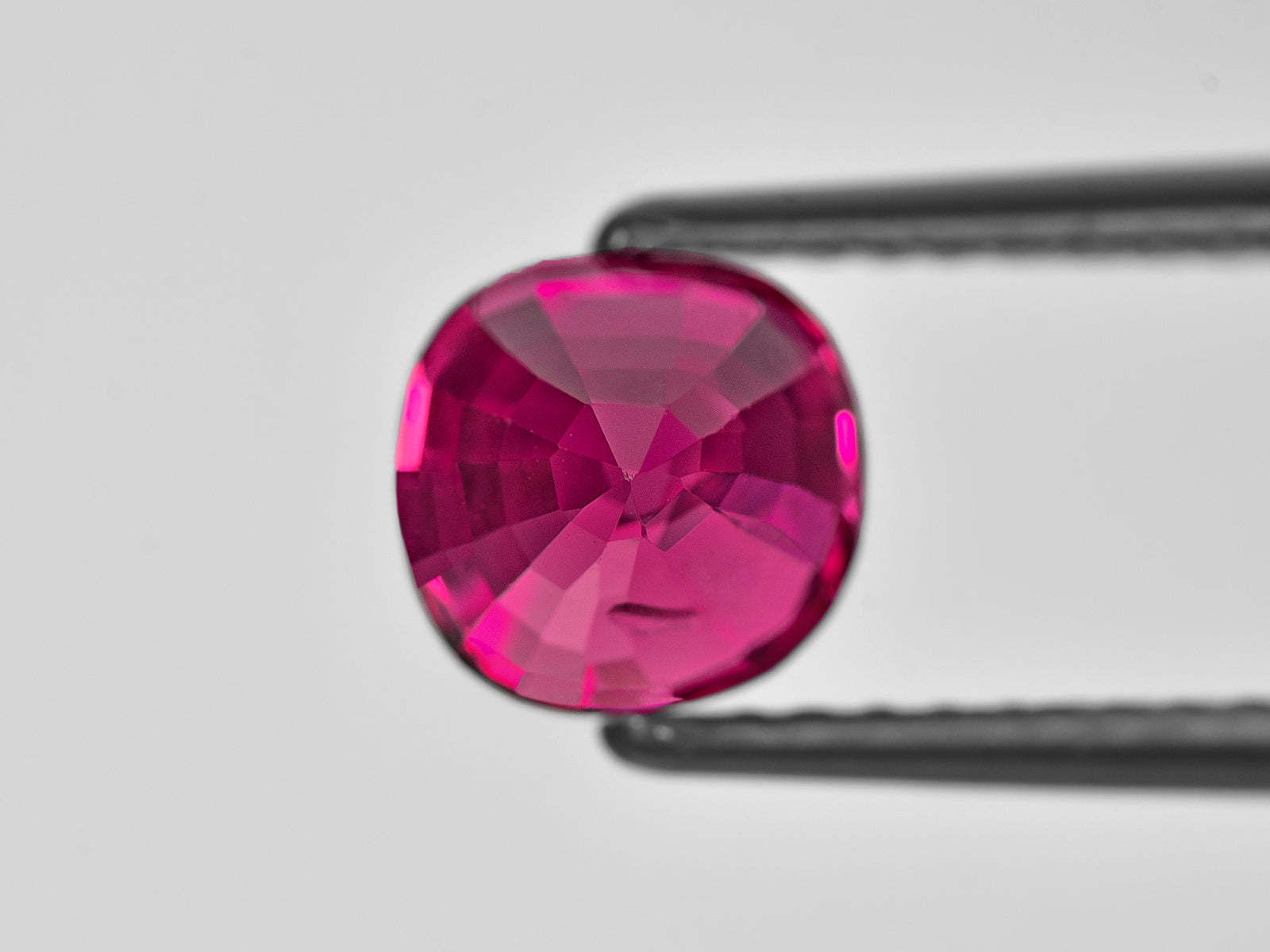 8801921-cushion-fiery-vivid-pinkish-red-burma-natural-ruby-3.01-ct